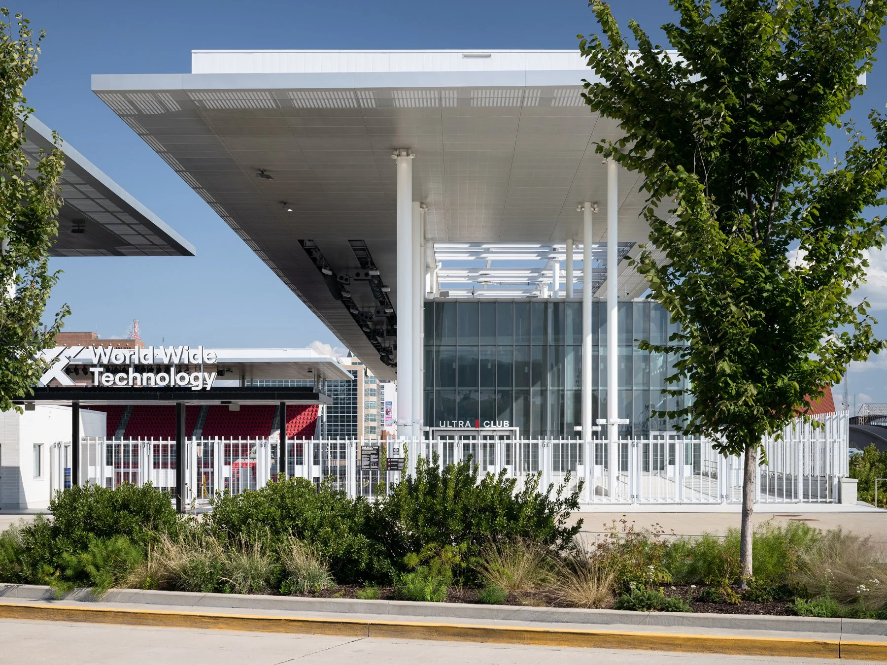 Energizer Park WWT Ultra Club entrance by day under the cantilevered canopy with views into the seating bowl, by HOK and Snow Kreilich, St. Louis Missouri - architectural photographer St. Louis Missouri