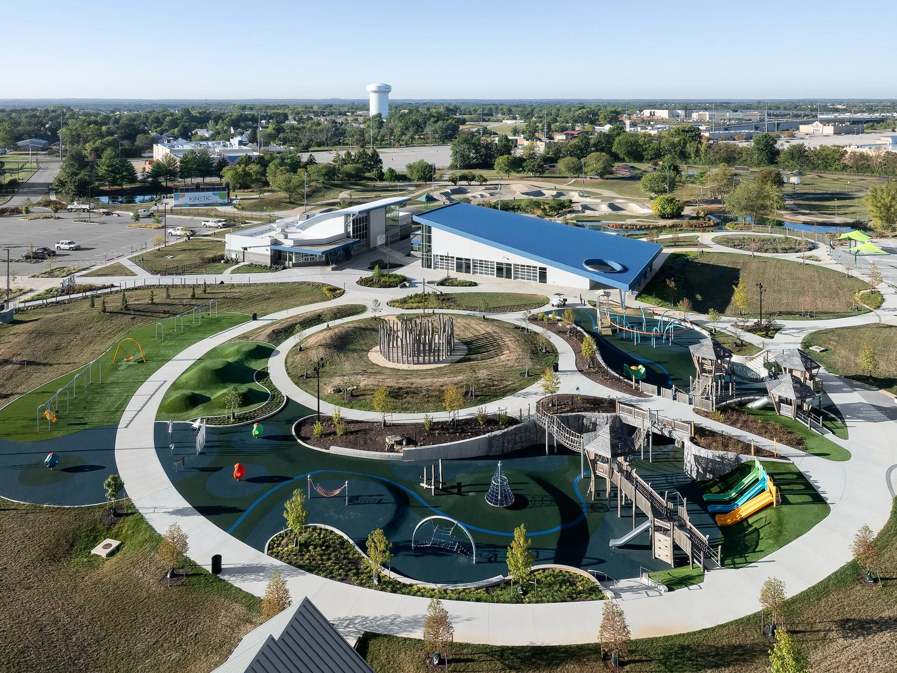 Kinetic Park aerial over the pavilion and circular park layout with adventure playground, by JEMA - architectural photographer St. Louis Missouri