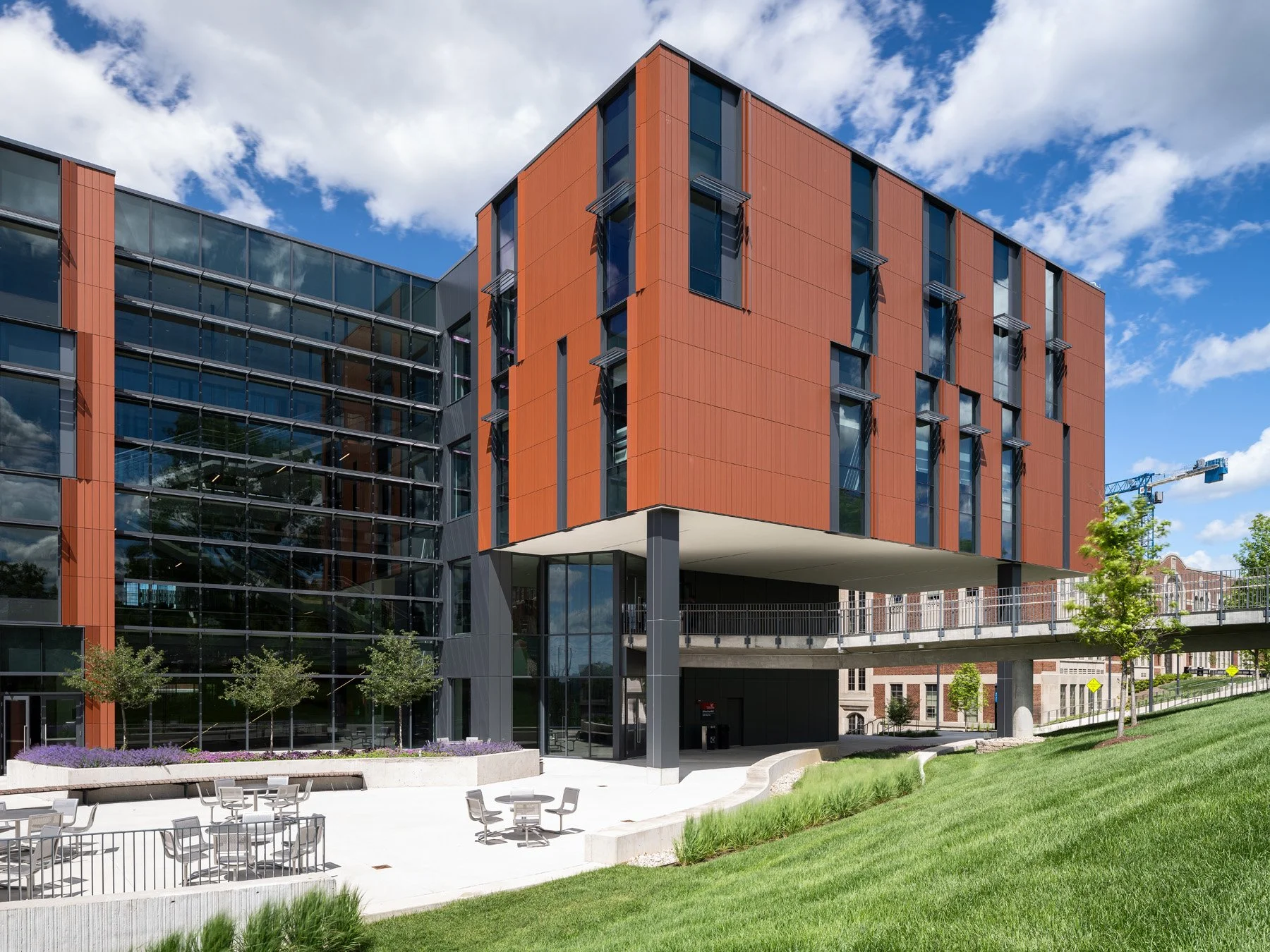Clifton Court Hall cantilevered terracotta volume above the courtyard plaza, by LMN Architects and KZF Design - architectural photographer Cincinnati Ohio