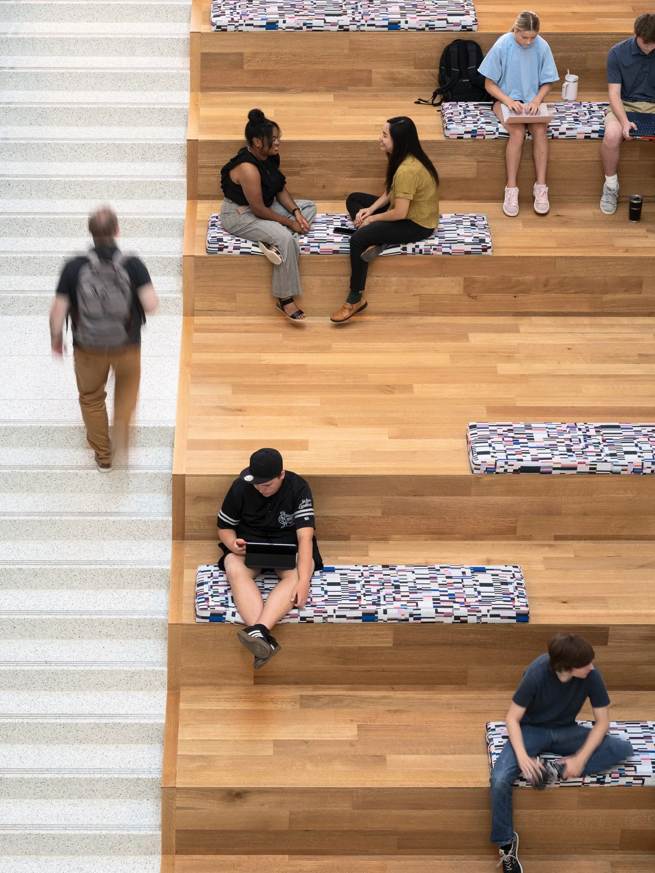 STLCC Florissant Valley Advanced Manufacturing Center wood stepped seating detail by JEMA - architectural photographer St. Louis Missouri
