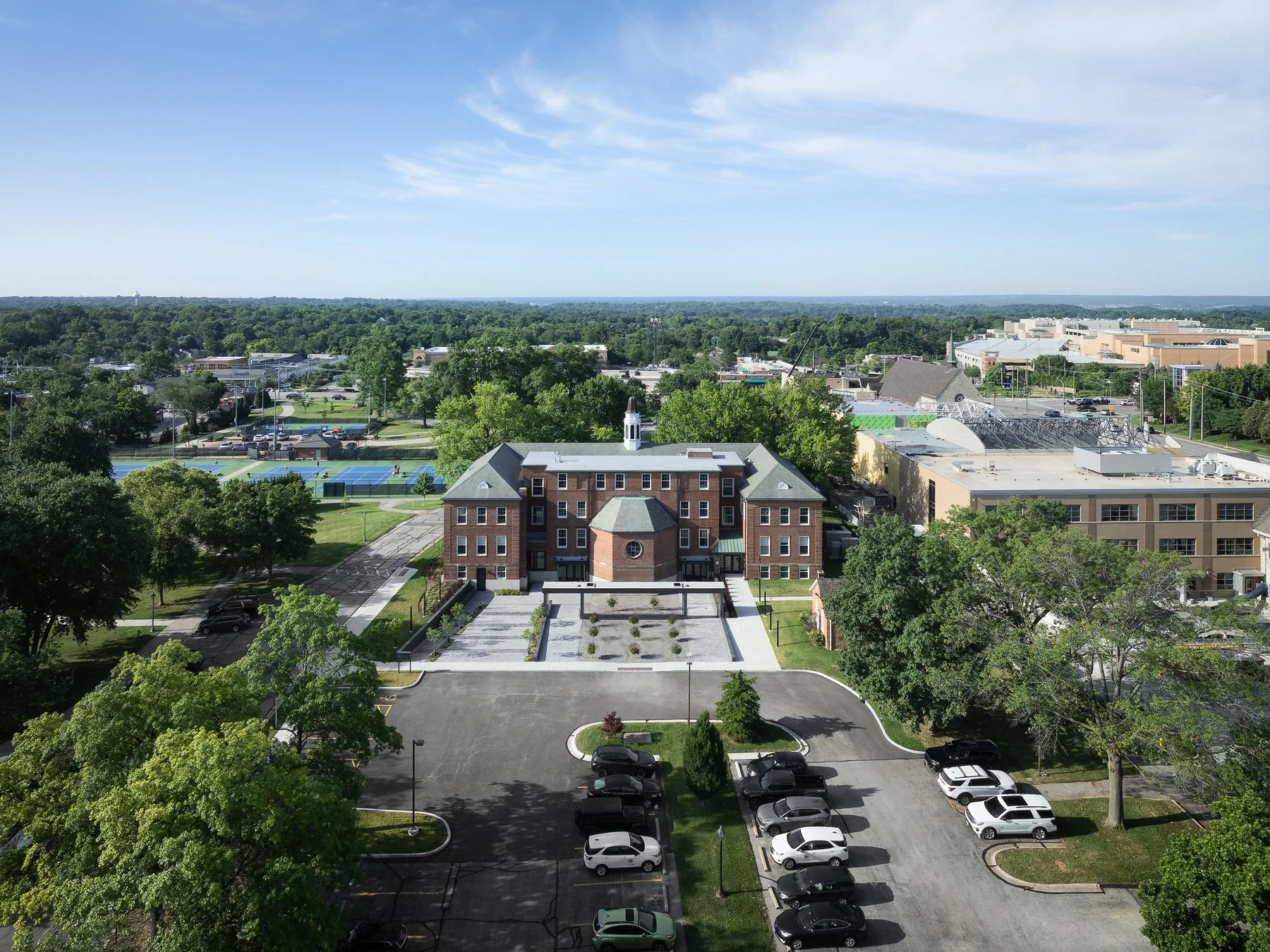 Des Peres City Hall aerial view of 1936 brick building and paved plaza by Patterhn Ives, Des Peres Missouri - architectural photographer St. Louis