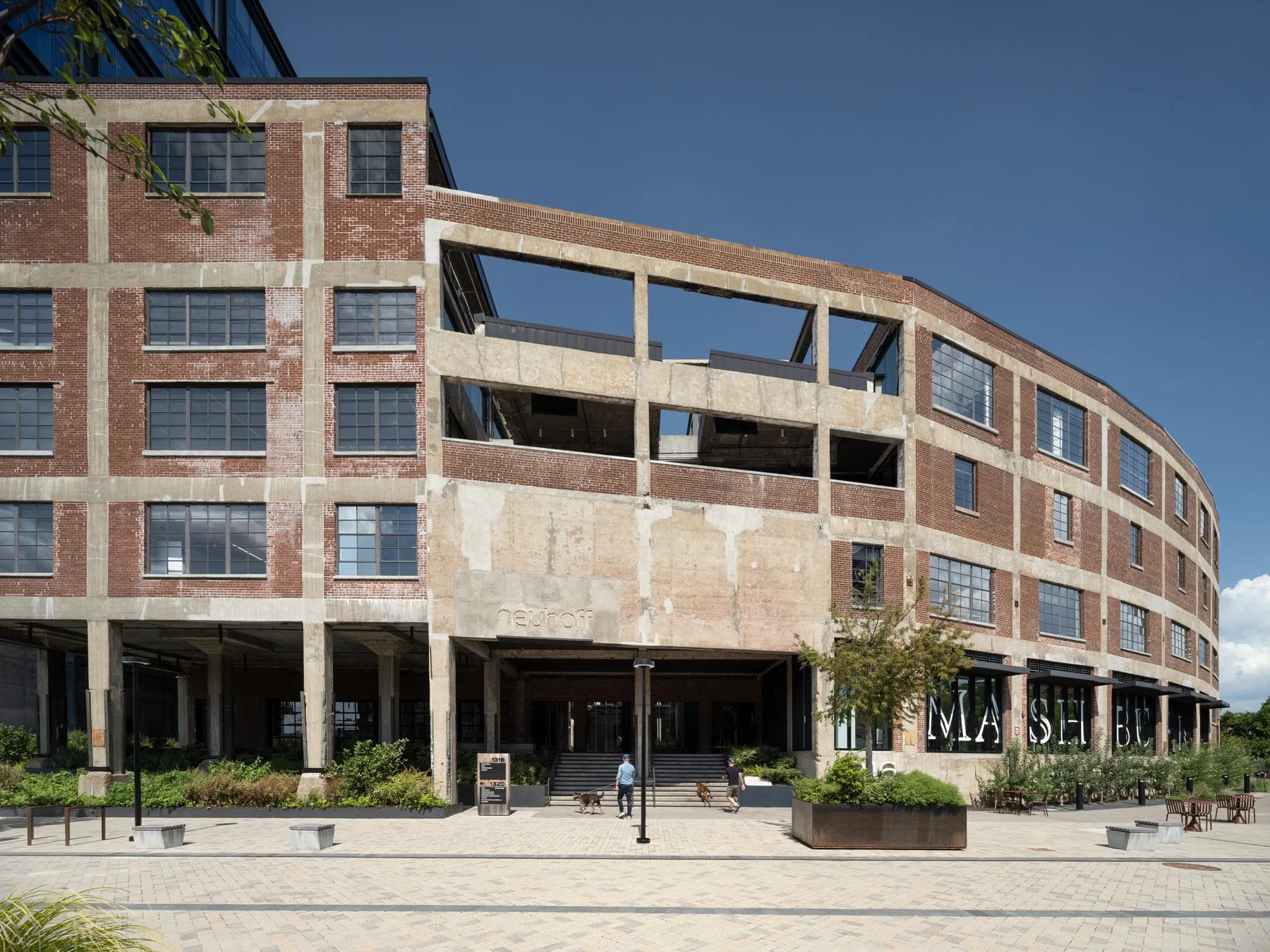 Neuhoff District Curve building brick facade and open concrete frame by Smith Gee Studio - architectural photographer Nashville Tennessee