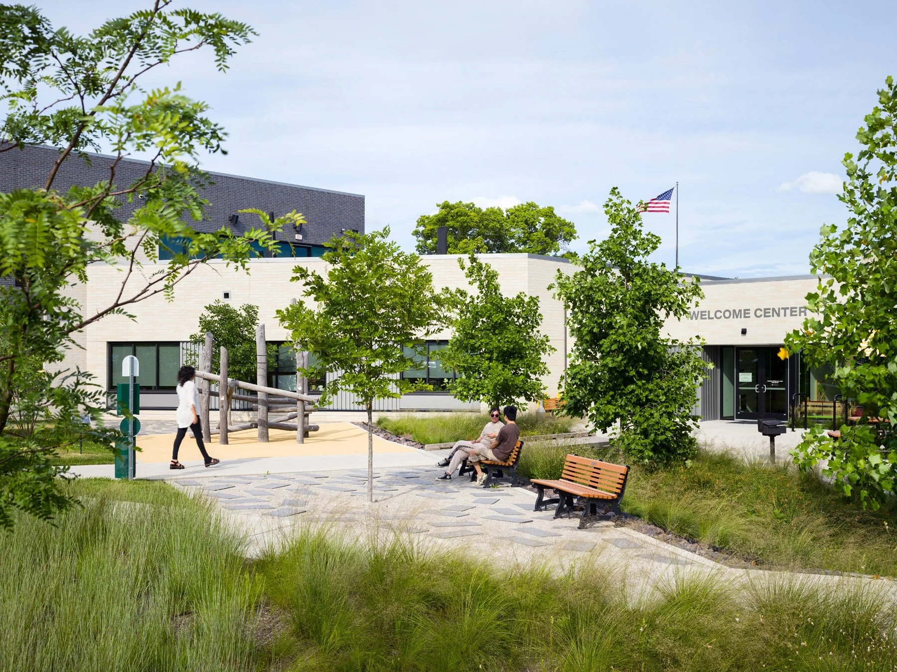 DOORWAYS welcome center courtyard with playground and seating, landscape by Arbolope Studio - architectural photographer St. Louis Missouri