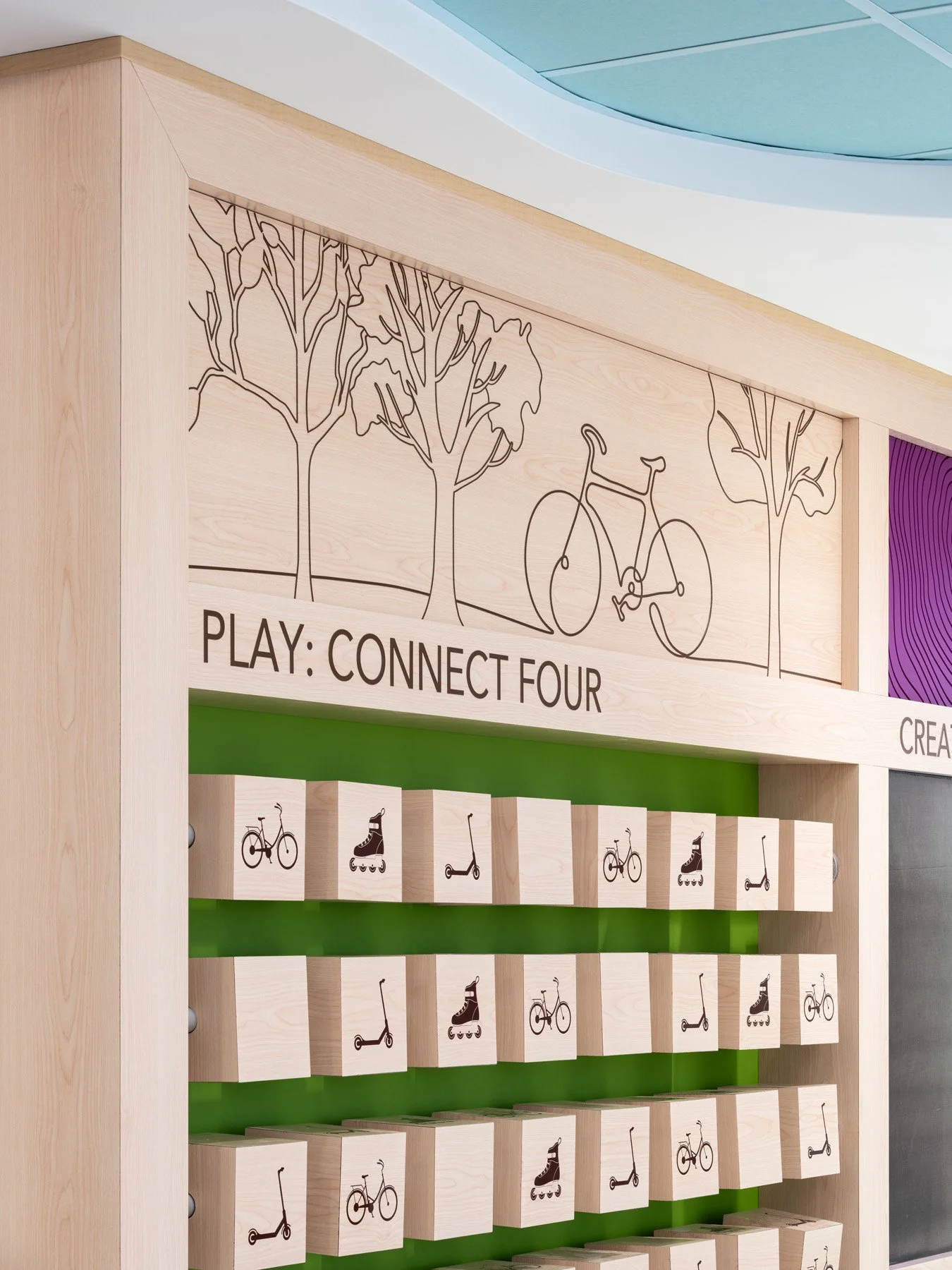 St. Louis Children’s Hospital Connect Four play wall with bike and scooter blocks, by CannonDesign - architectural photographer St. Louis Missouri