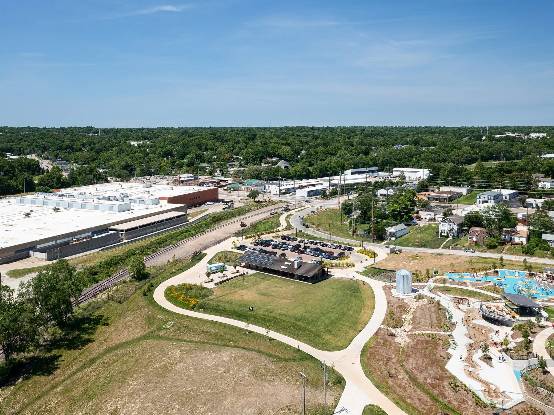 Brentwood Park Event Pavilion aerial view showing pavilion, parking, and restored floodplain park by Christner - architectural photographer St. Louis Missouri