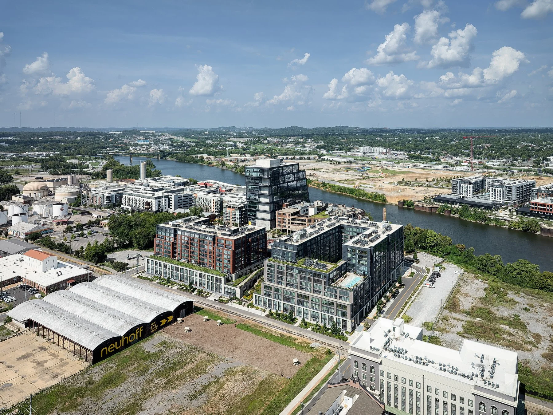 Neuhoff District aerial over the Cumberland River with the office tower by S9 Architecture - architectural photographer Nashville Tennessee