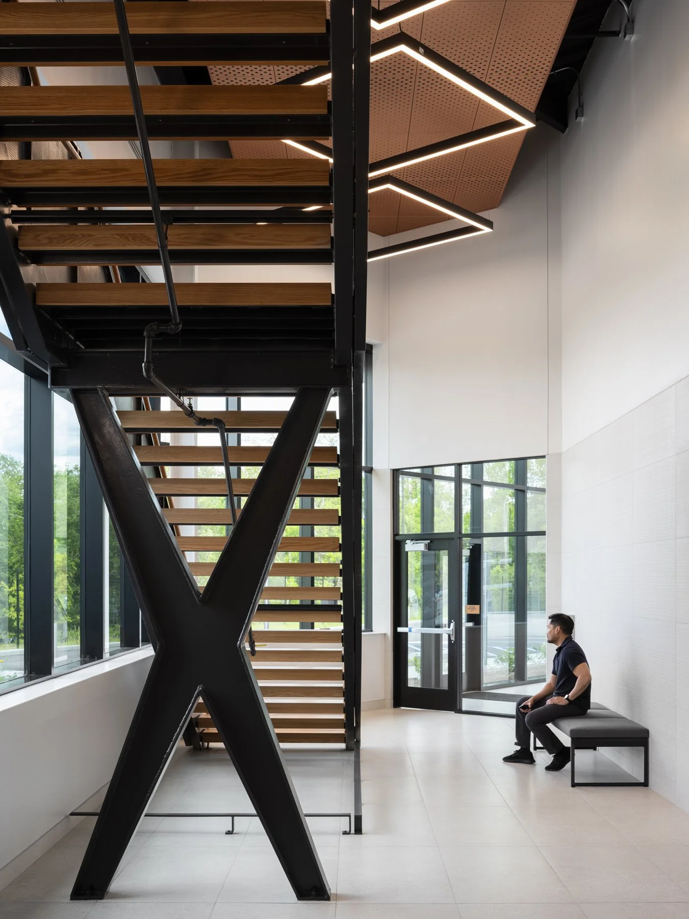 Detective Antonio Valentine Building interior steel X-brace stair by JEMA, Maryland Heights Missouri - architectural photographer St. Louis Missouri