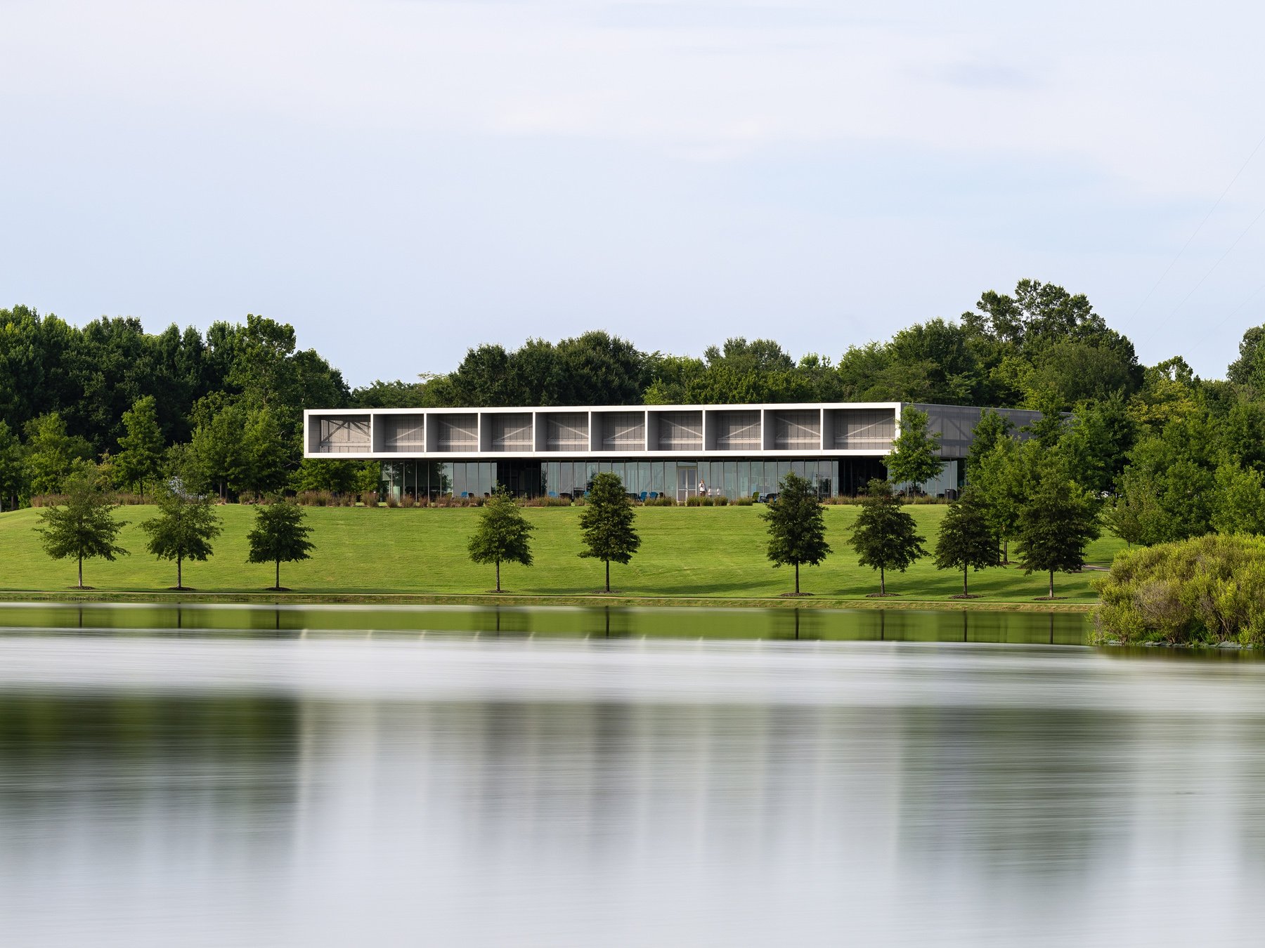 Shelby Farms Park visitor center reflected in the lake, by Marlon Blackwell Architects - architectural photographer Memphis Tennessee