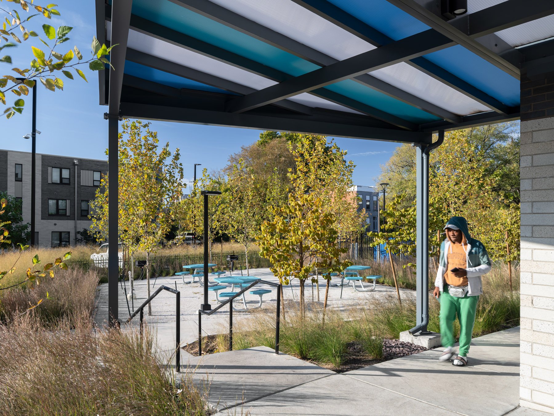 DOORWAYS covered pavilion overlooking picnic area and bioswale, landscape by Arbolope Studio - architectural photographer St. Louis Missouri