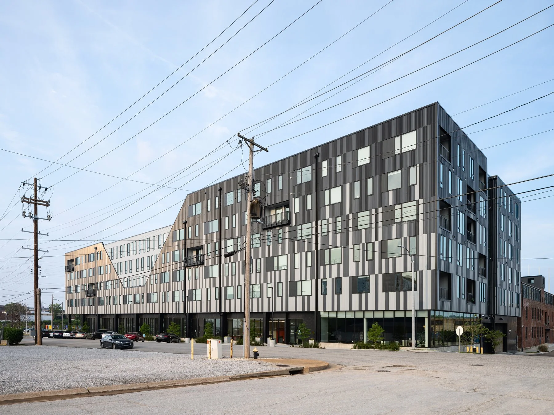 Steelcote Flats corrugated metal west facade on the street corner, by Trivers - architectural photographer St. Louis Missouri