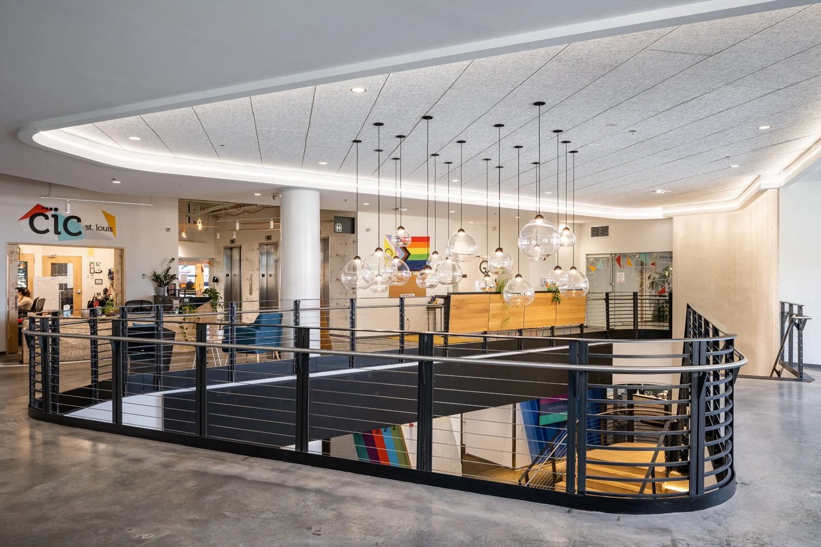 4220 Duncan interior CIC St. Louis lobby mezzanine with glass globe pendant lights, by HOK - architectural photographer St. Louis Missouri