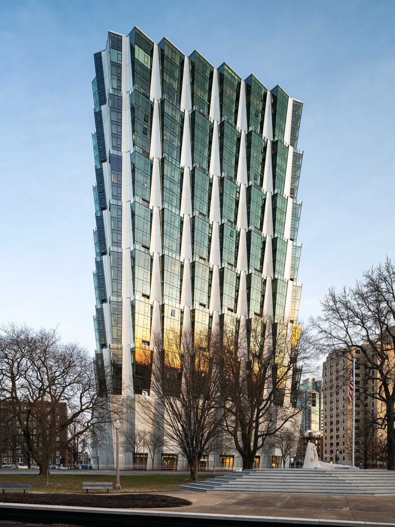 One Hundred Above the Park full tower at dusk showing faceted glazing and corrugated fins, by Studio Gang - architectural photographer St. Louis Missouri