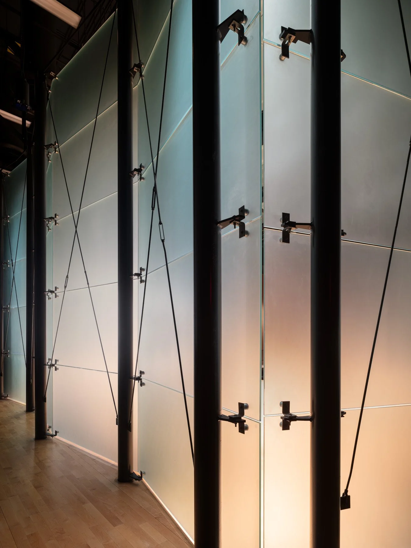 Doudna Fine Arts Center interior detail of backlit translucent glass panels and steel columns by Antoine Predock, Charleston Illinois - architectural photographer