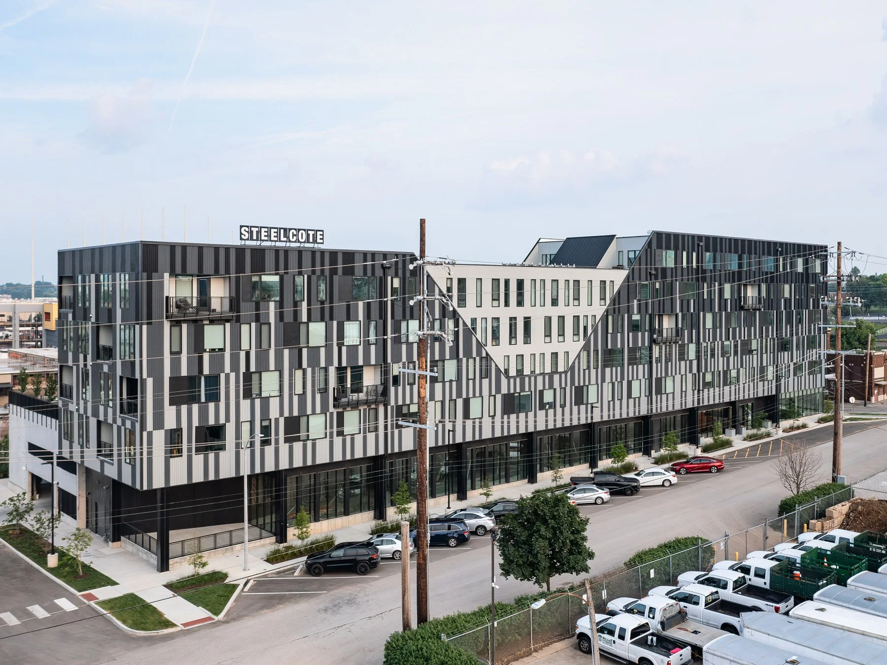 Steelcote Flats corrugated facade with its central white notch and rooftop Steelcote sign, by Trivers - architectural photographer St. Louis Missouri