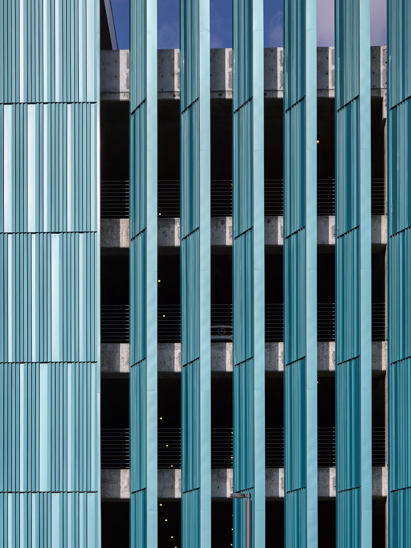 Crystal Bridges Parking fins layered over the exposed concrete parking decks, by Marlon Blackwell - architectural photographer Bentonville Arkansas