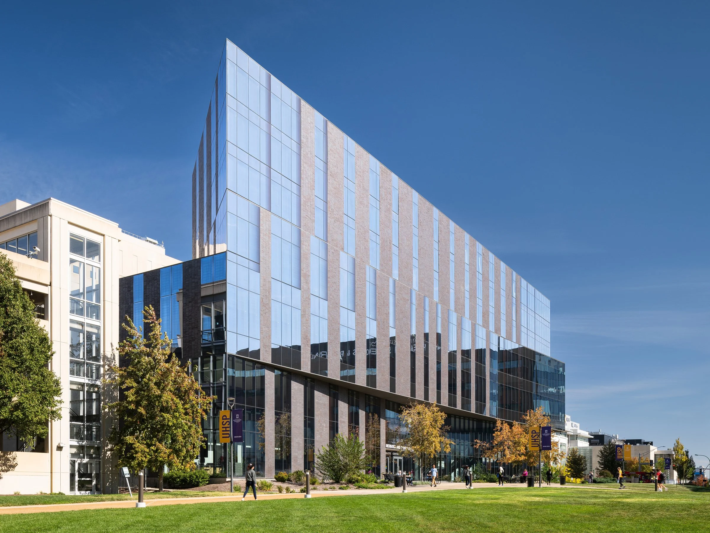 UHSP Recreation and Student Center angled curtain wall with silkscreen glass pattern by Lamar Johnson Collaborative, St. Louis Missouri - architectural photographer St. Louis