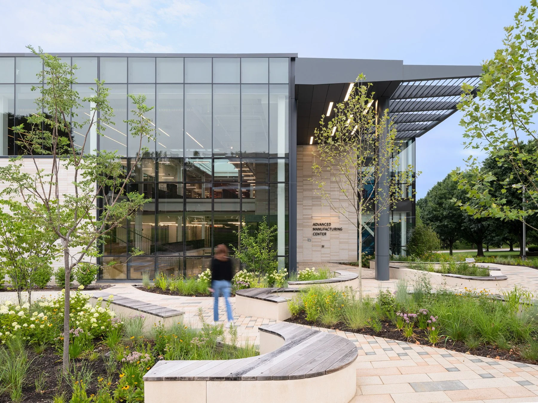 STLCC Florissant Valley Advanced Manufacturing Center entry plaza benches, landscape by DG2 Design - architectural photographer St. Louis Missouri