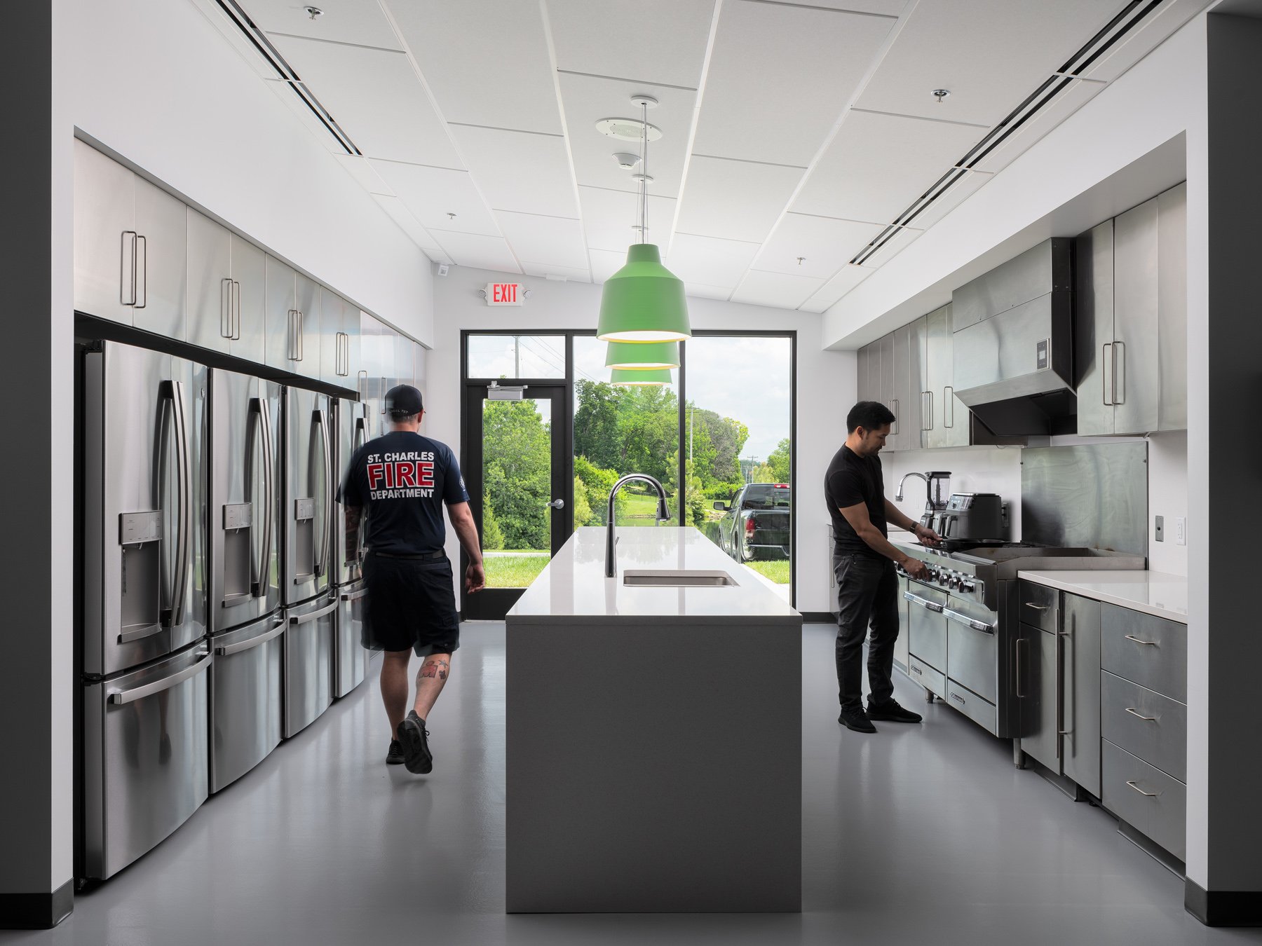 St. Charles fire station interior kitchen with a refrigerator bank, by JEMA, St. Charles Missouri - architectural photographer St. Louis Missouri