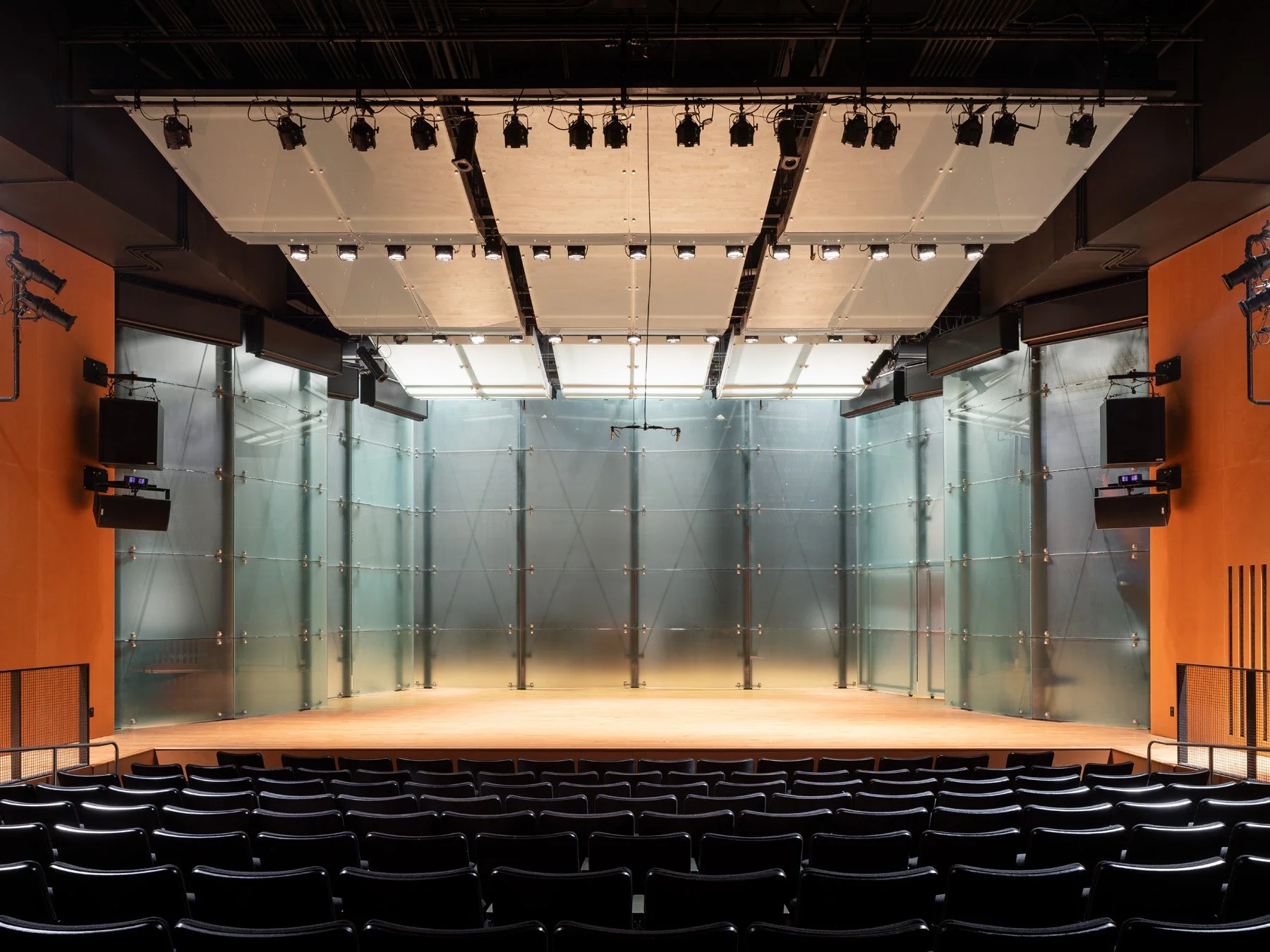 Doudna Fine Arts Center black box theatre with translucent glass stage wall and orange side walls by Antoine Predock, Charleston Illinois - architectural photographer