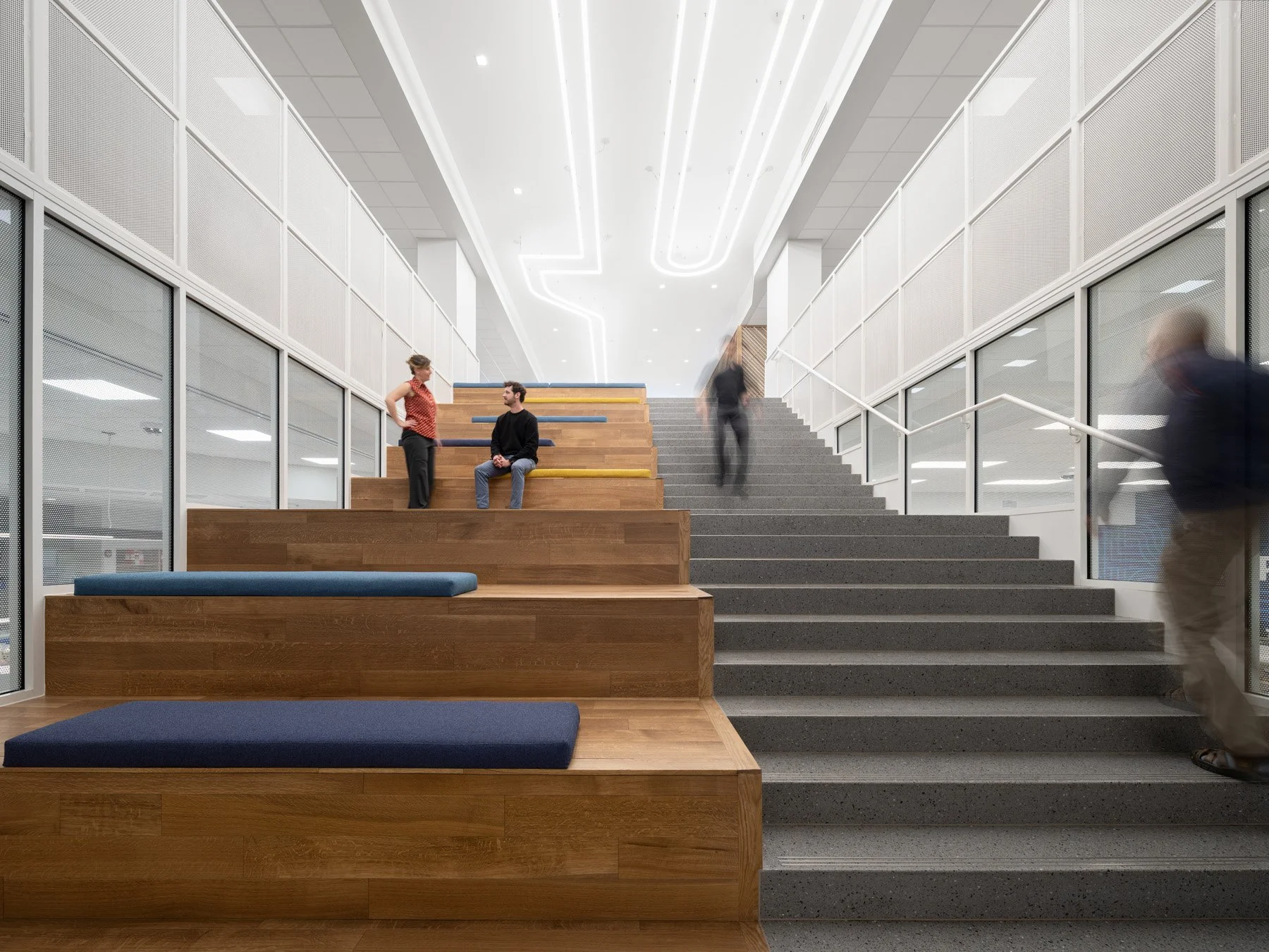 STLCC Florissant Valley Student Center stair between white mesh guardrails by JEMA, Ferguson Missouri - architectural photographer St. Louis