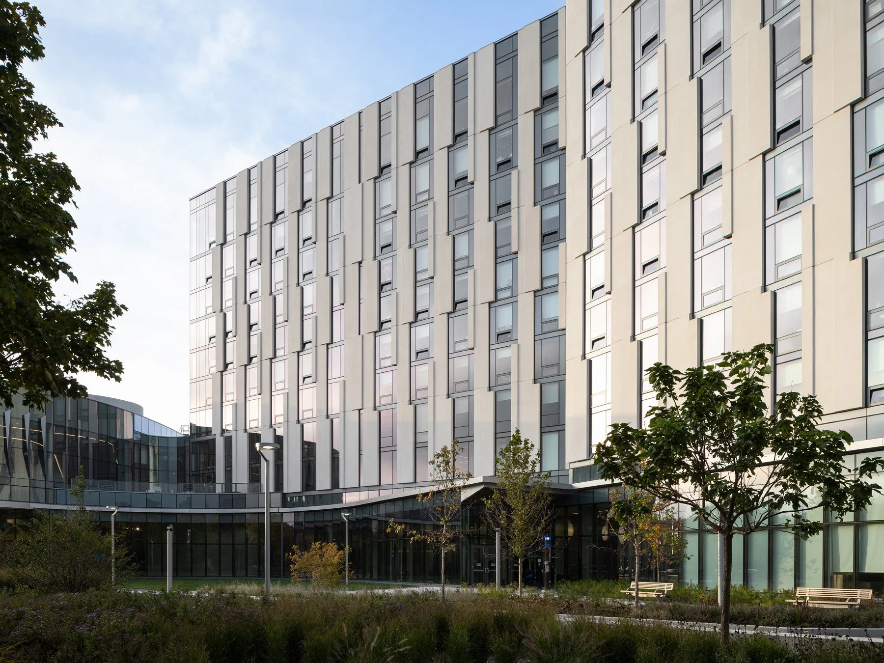 UIC Academic and Residential Complex residential slab and entry canopy at dusk, by SCB - architectural photographer Chicago Illinois