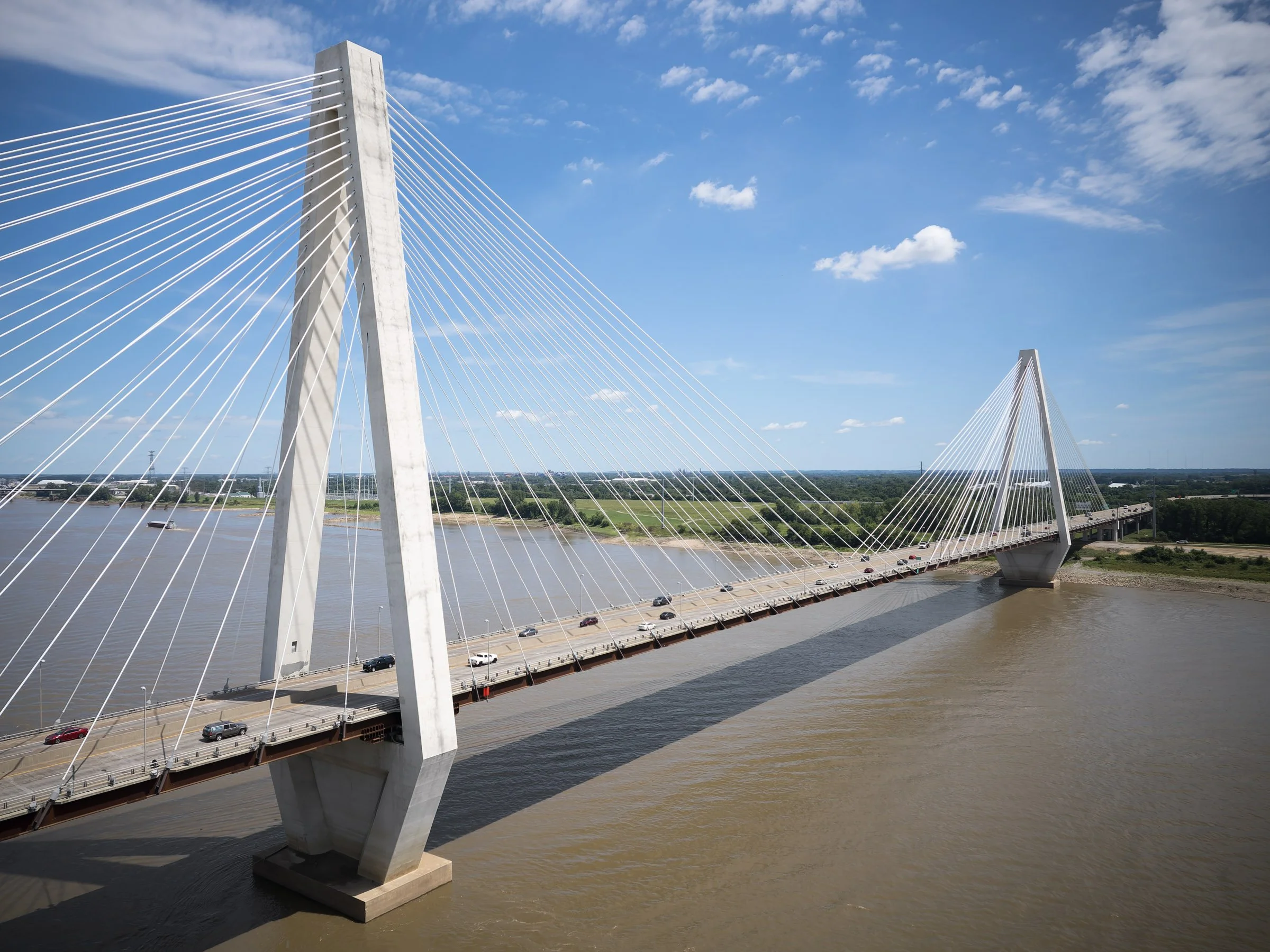 Stan Musial Veterans Memorial Bridge cable-stayed structure with delta concrete towers over the Mississippi River by HNTB, St. Louis Missouri - architectural photographer St. Louis