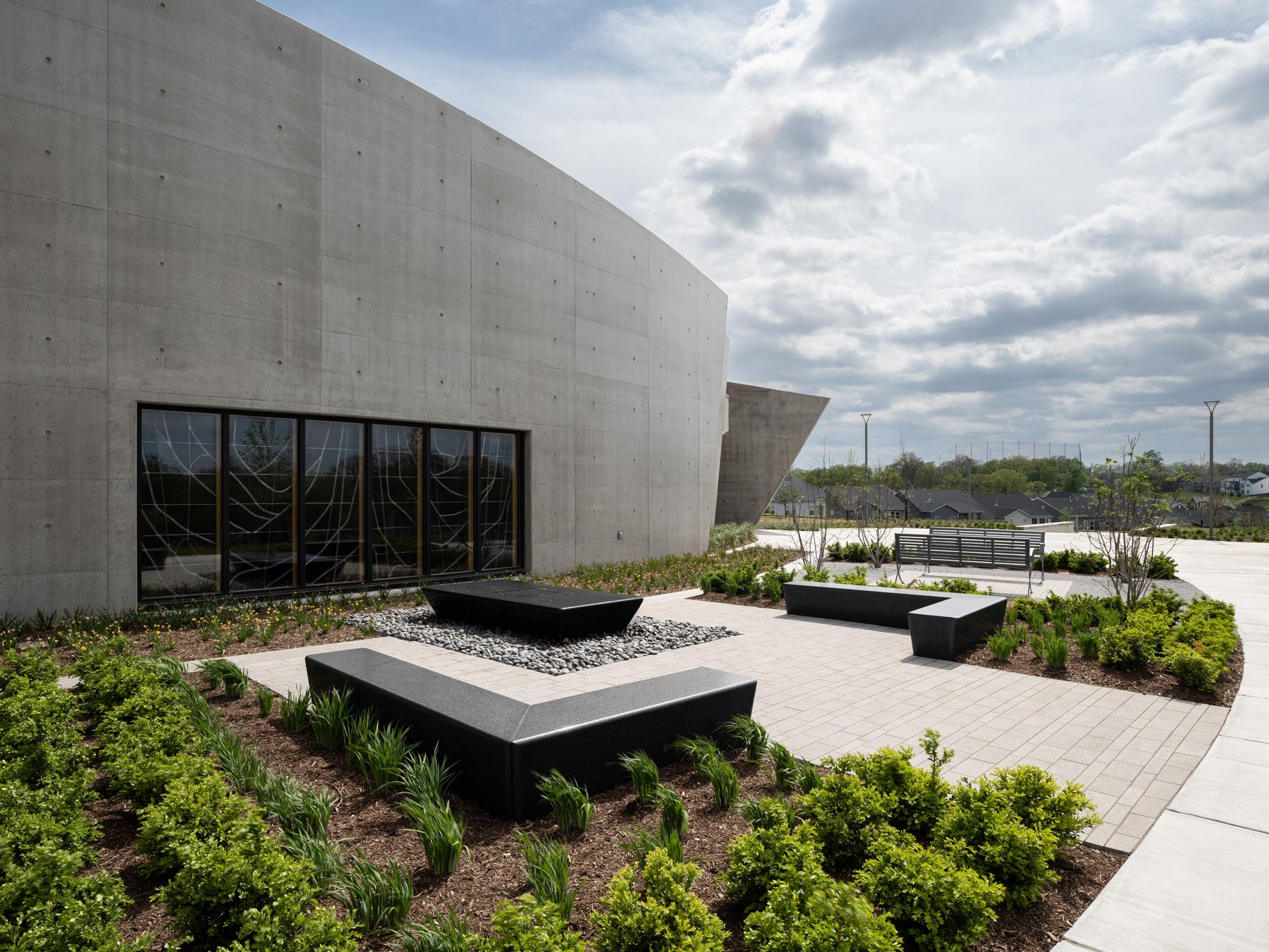 Chapel of the Risen Christ granite benches and water feature in garden plaza, landscape by SWT Design - architectural photographer St. Louis Missouri
