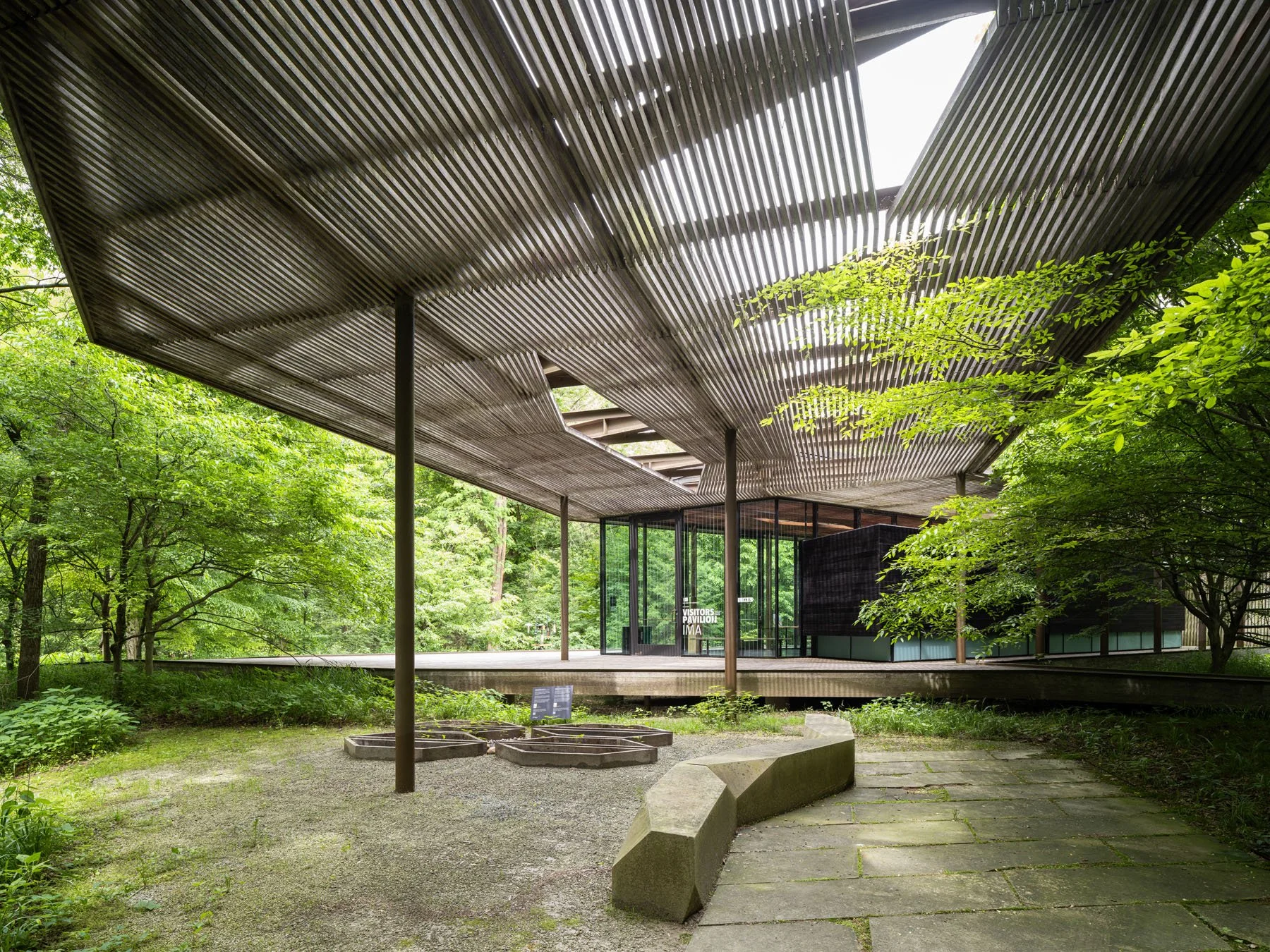Ruth Lilly Visitors Pavilion covered approach with slatted wood canopy over gravel court, by Marlon Blackwell Architects, Indianapolis Indiana - architectural photographer