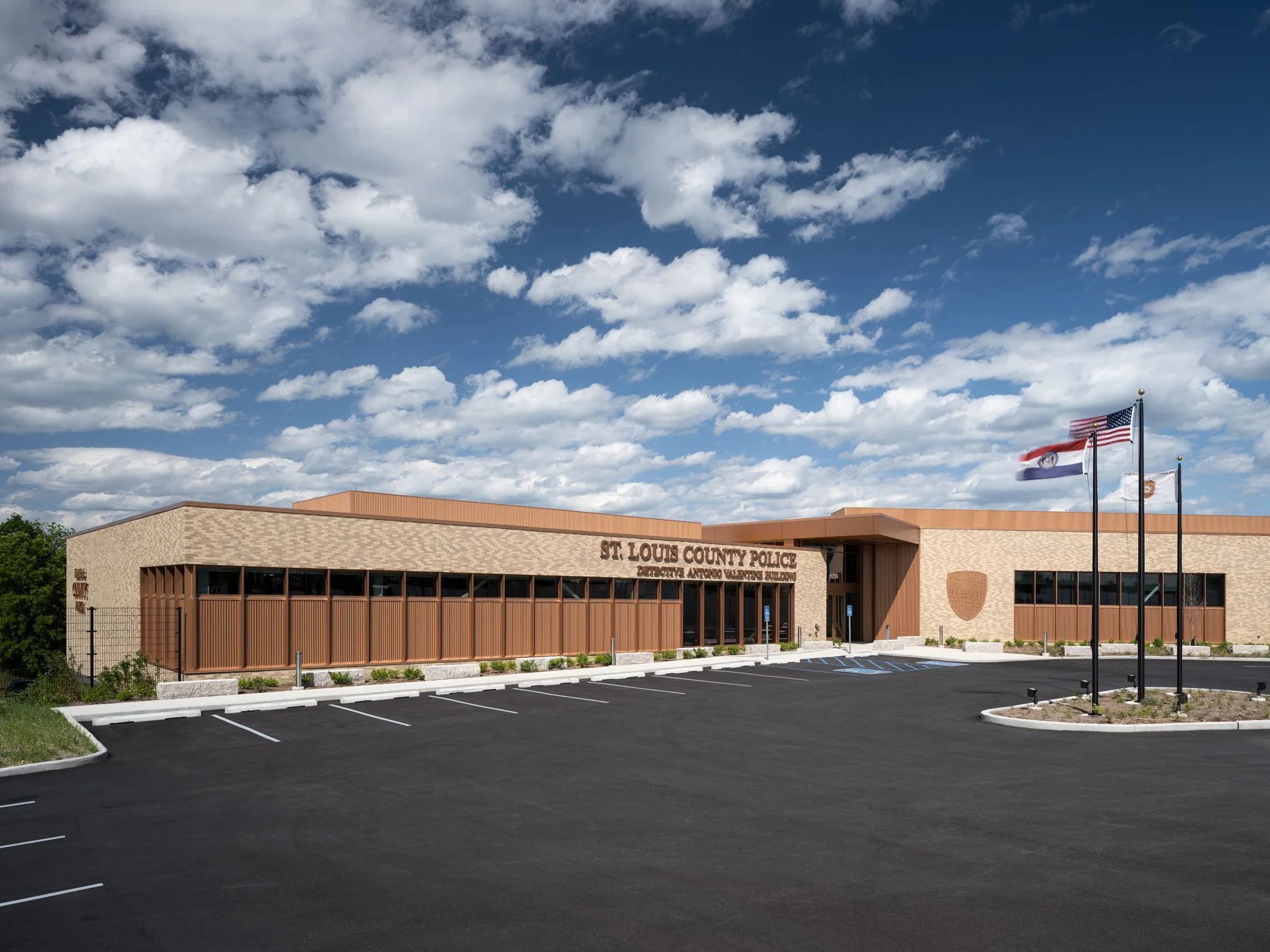 Detective Antonio Valentine Building exterior entrance and flags by JEMA, Maryland Heights Missouri - architectural photographer St. Louis Missouri