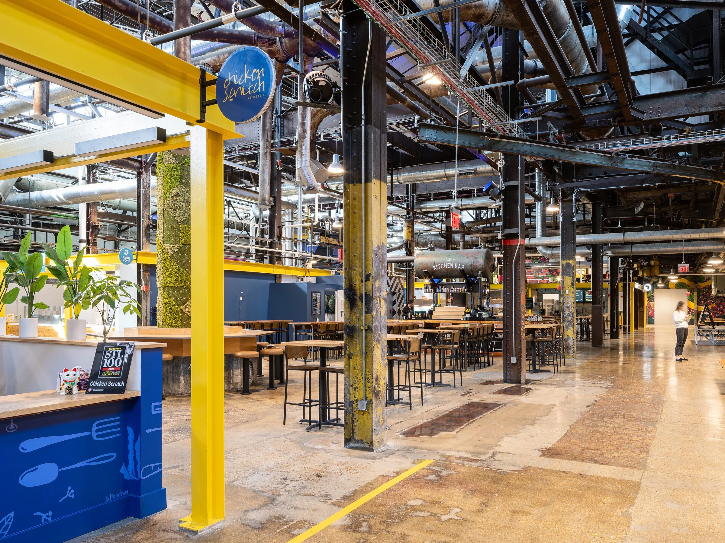 City Foundry adaptive reuse food hall interior with preserved overhead cranes by The Lawrence Group, St. Louis Missouri - architectural photographer St. Louis