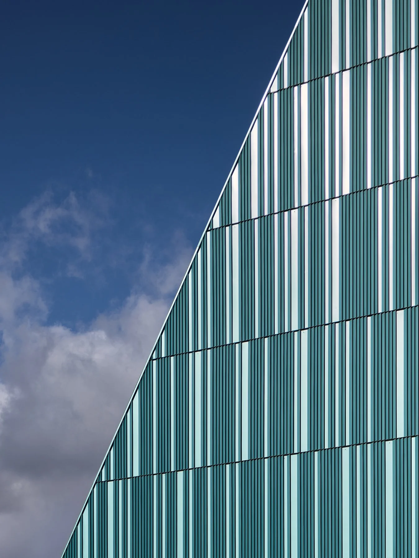 Crystal Bridges Parking diagonal roofline cutting across the teal fin wall, by Marlon Blackwell - architectural photographer Bentonville Arkansas