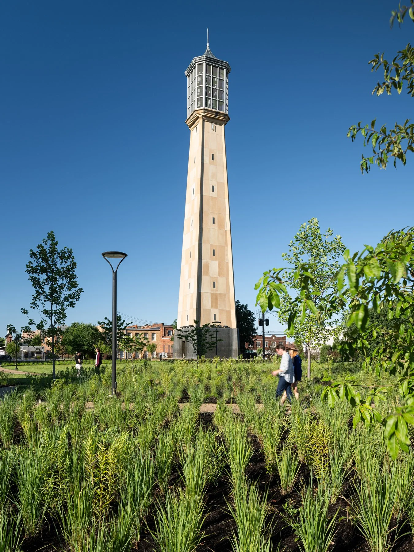 Carillon Park the carillon tower rising beyond a rush-planted basin, landscape by Arbolope Studio - architectural photographer Centralia Illinois