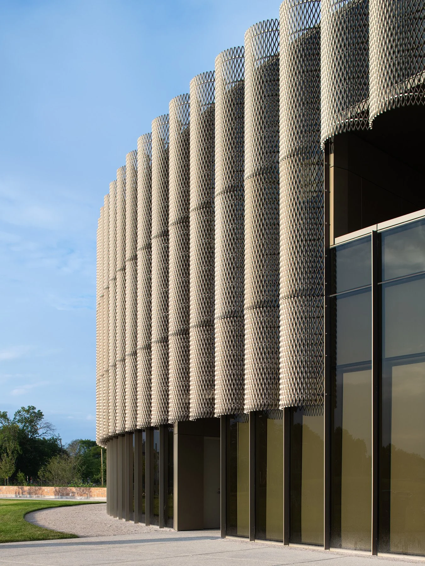 Chicago Park District HQ curved expanded metal screen facade detail at ground level, by John Ronan Architects - architectural photographer Chicago Illinois