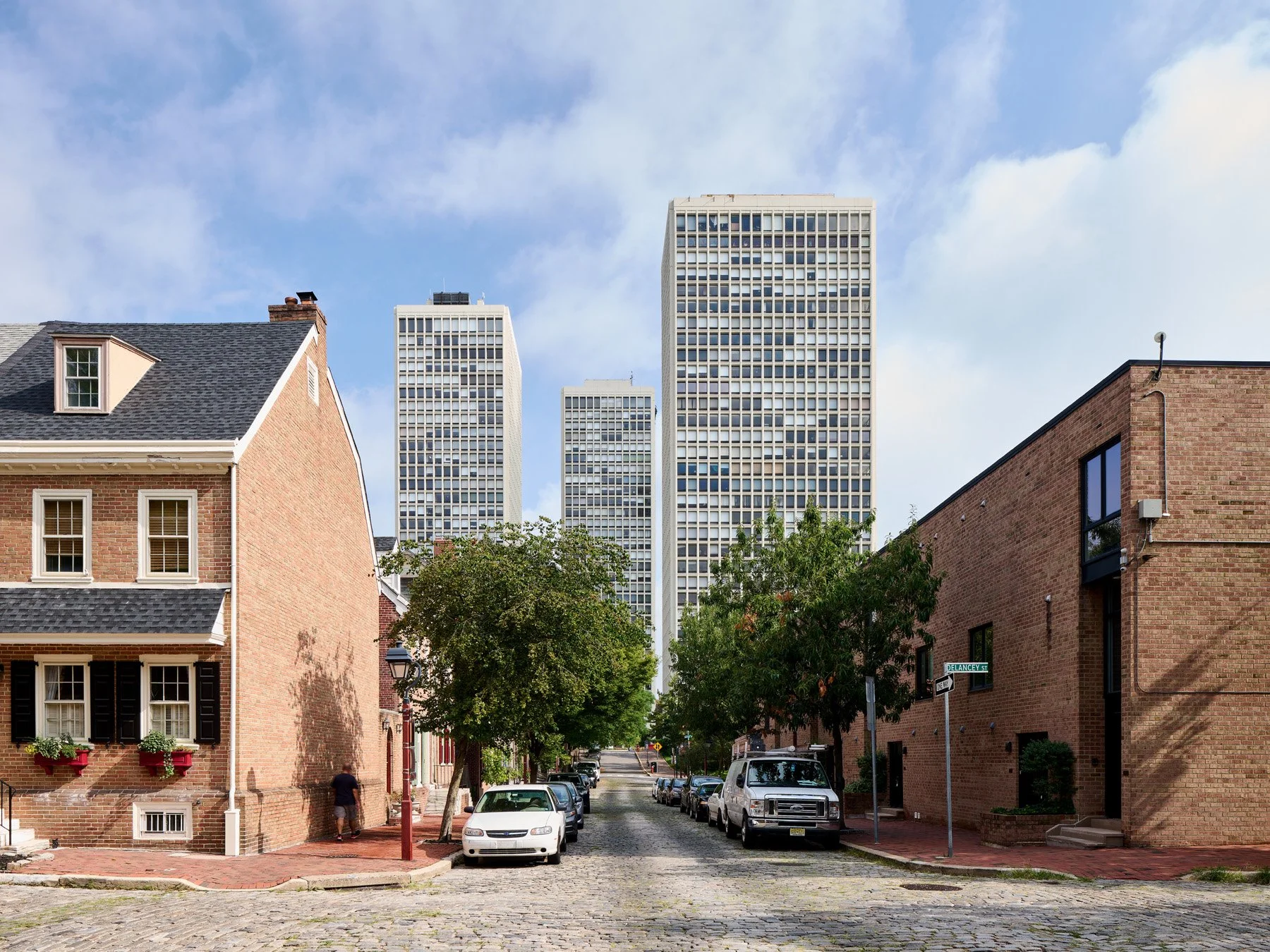 Society Hill Towers above rowhouses on a cobblestone street by I.M. Pei, Philadelphia Pennsylvania - architectural photographer Philadelphia