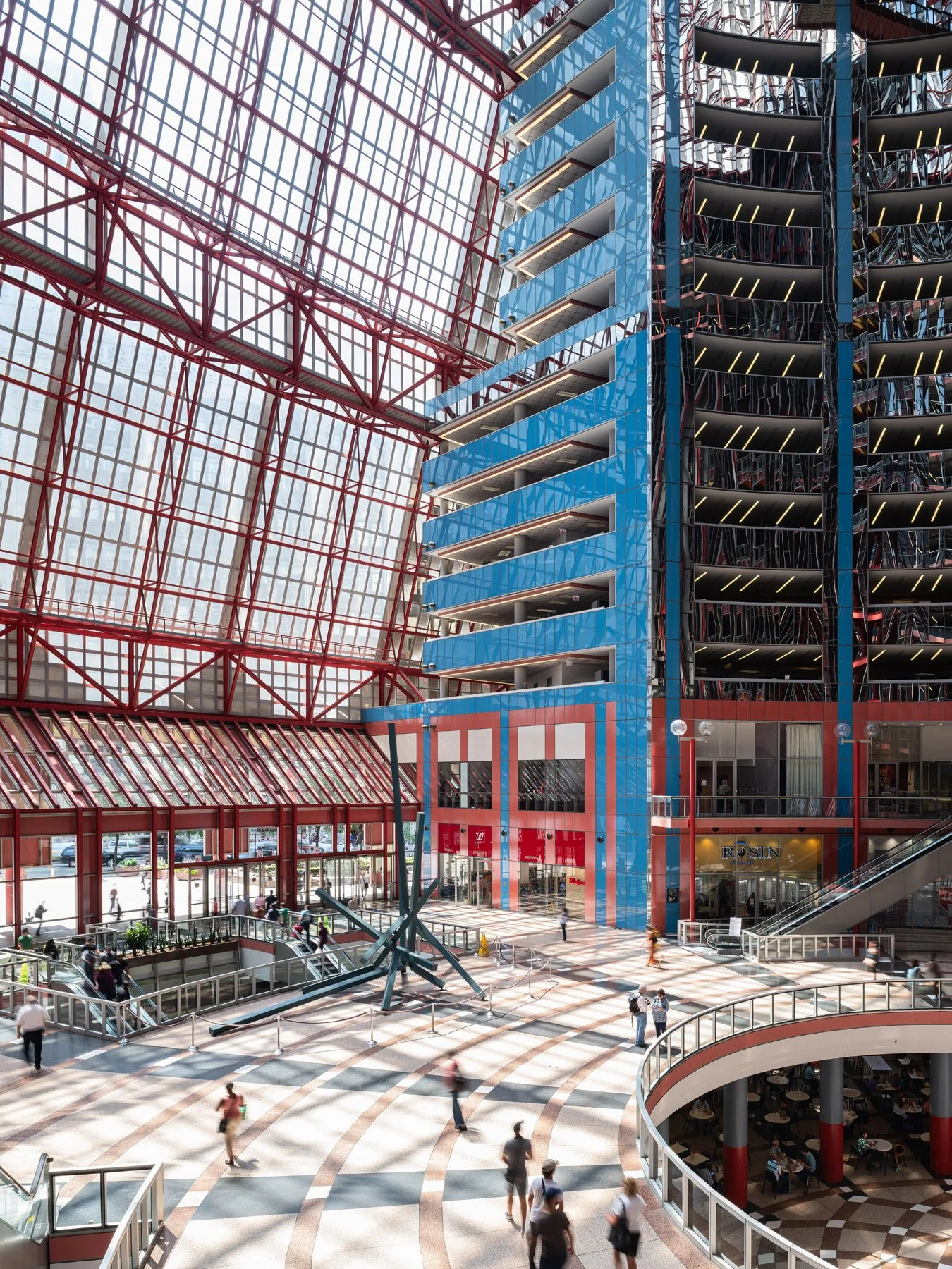 James R. Thompson Center atrium with the red space frame skylight and food court below, Chicago - exposed steel interior