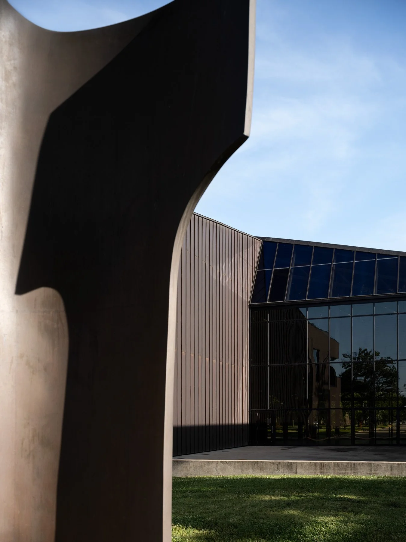 Doudna Fine Arts Center exterior glazed facade framed by a steel sculpture by Antoine Predock, Charleston Illinois - architectural photographer