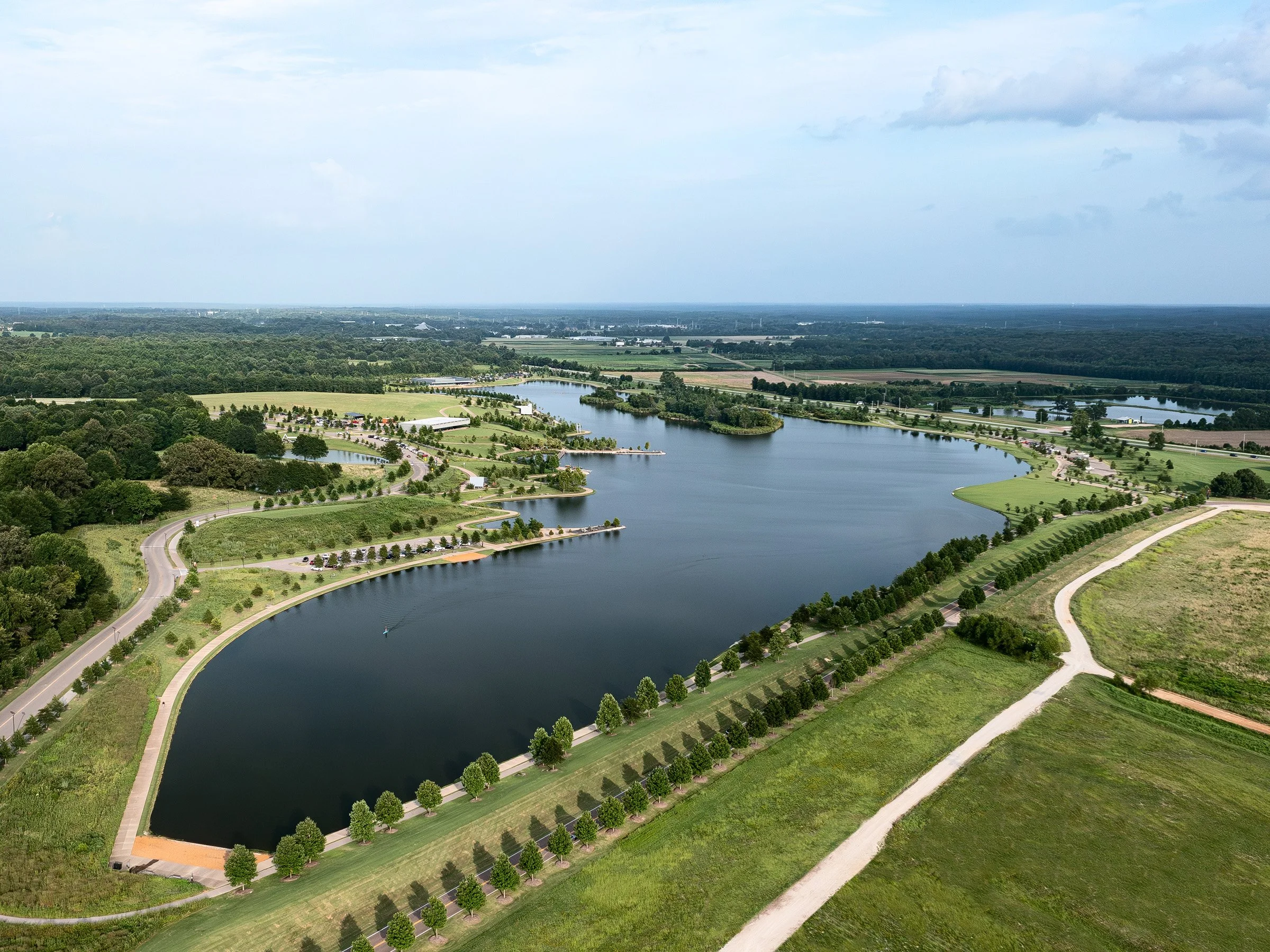 Shelby Farms Park aerial over the lake and trails, landscape by James Corner Field Operations - architectural photographer Memphis Tennessee