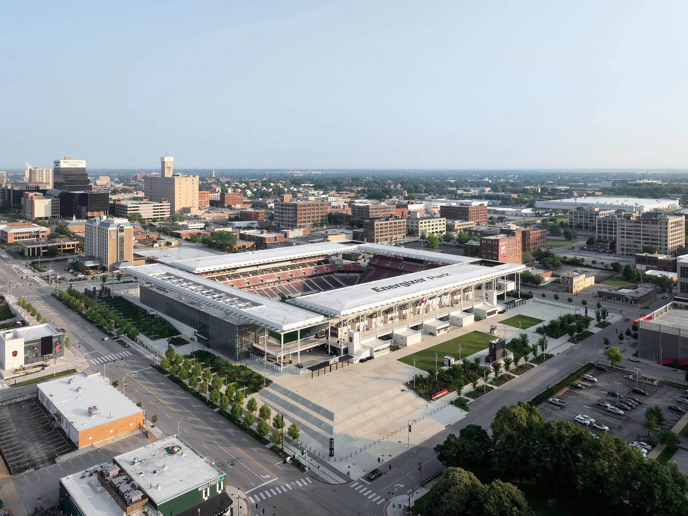 Energizer Park soccer stadium reflective canopy and open corner framing Gateway Arch by HOK and Snow Kreilich, St. Louis Missouri - architectural photographer St. Louis