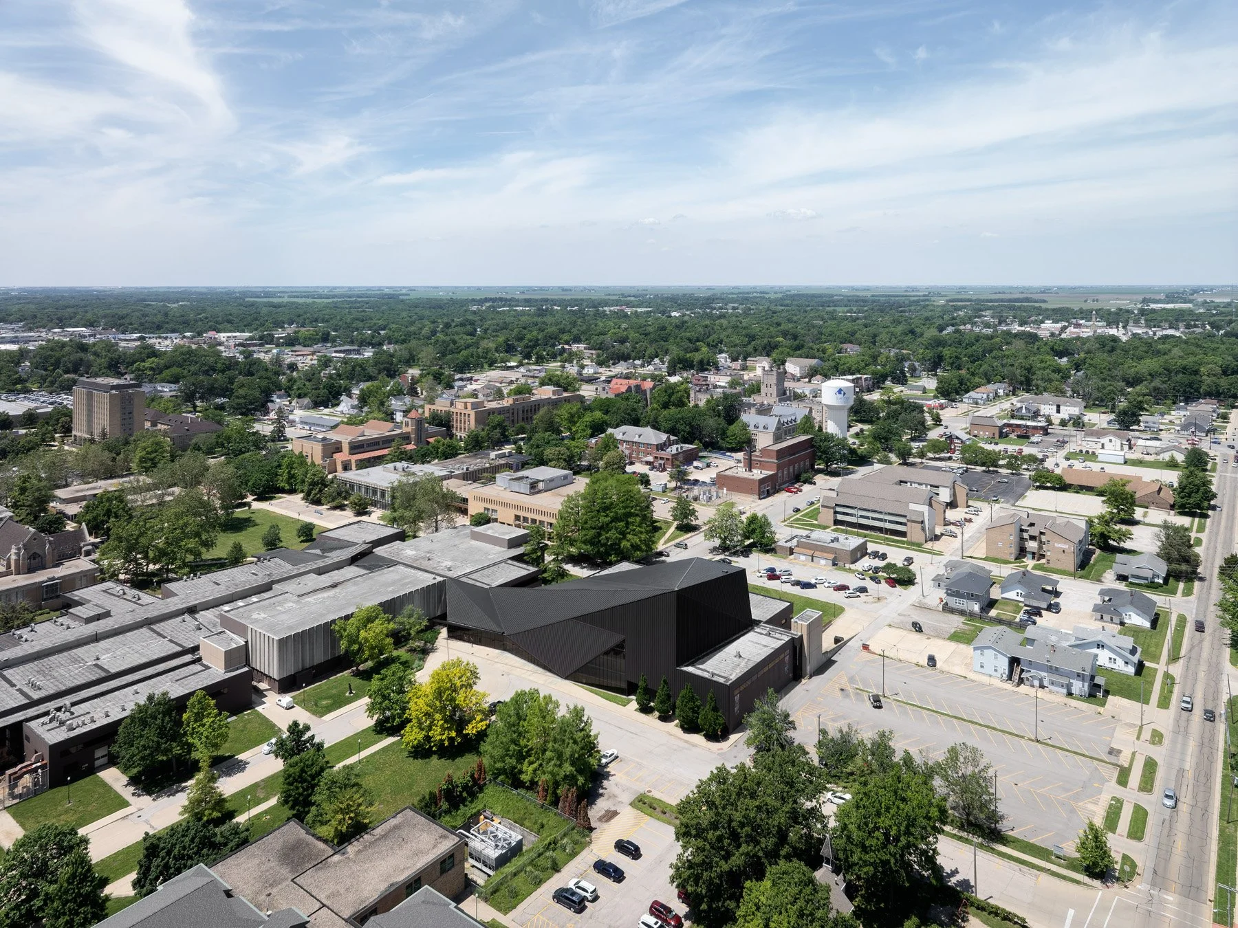 Doudna Fine Arts Center aerial view showing the dark copper roof set against the Eastern Illinois campus and downtown by Antoine Predock, Charleston Illinois