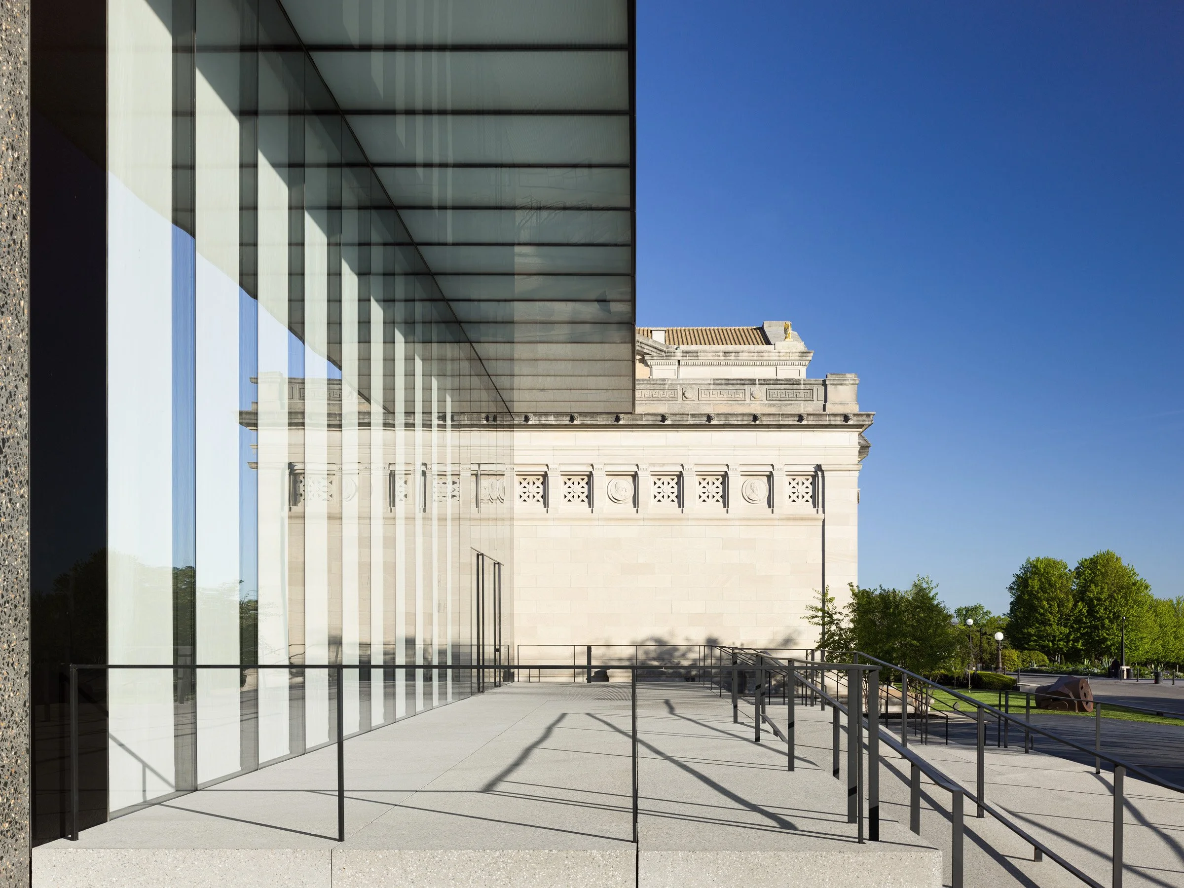 Saint Louis Art Museum East Building glass canopy beside the limestone facade, by David Chipperfield - architectural photographer St. Louis Missouri