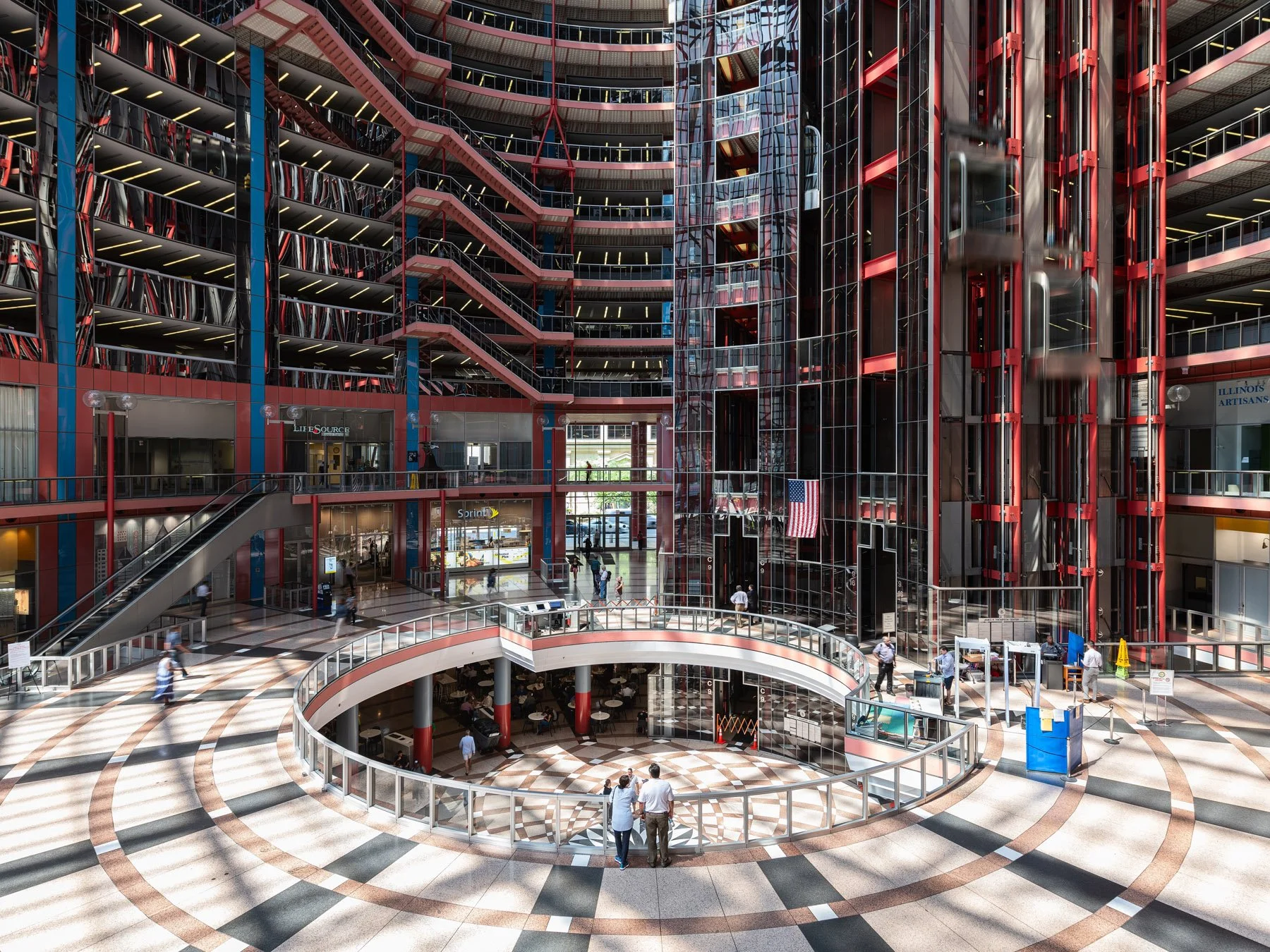 James R. Thompson Center atrium balcony over the inverted dome rosette floor and food court, Chicago - terrazzo floor pattern