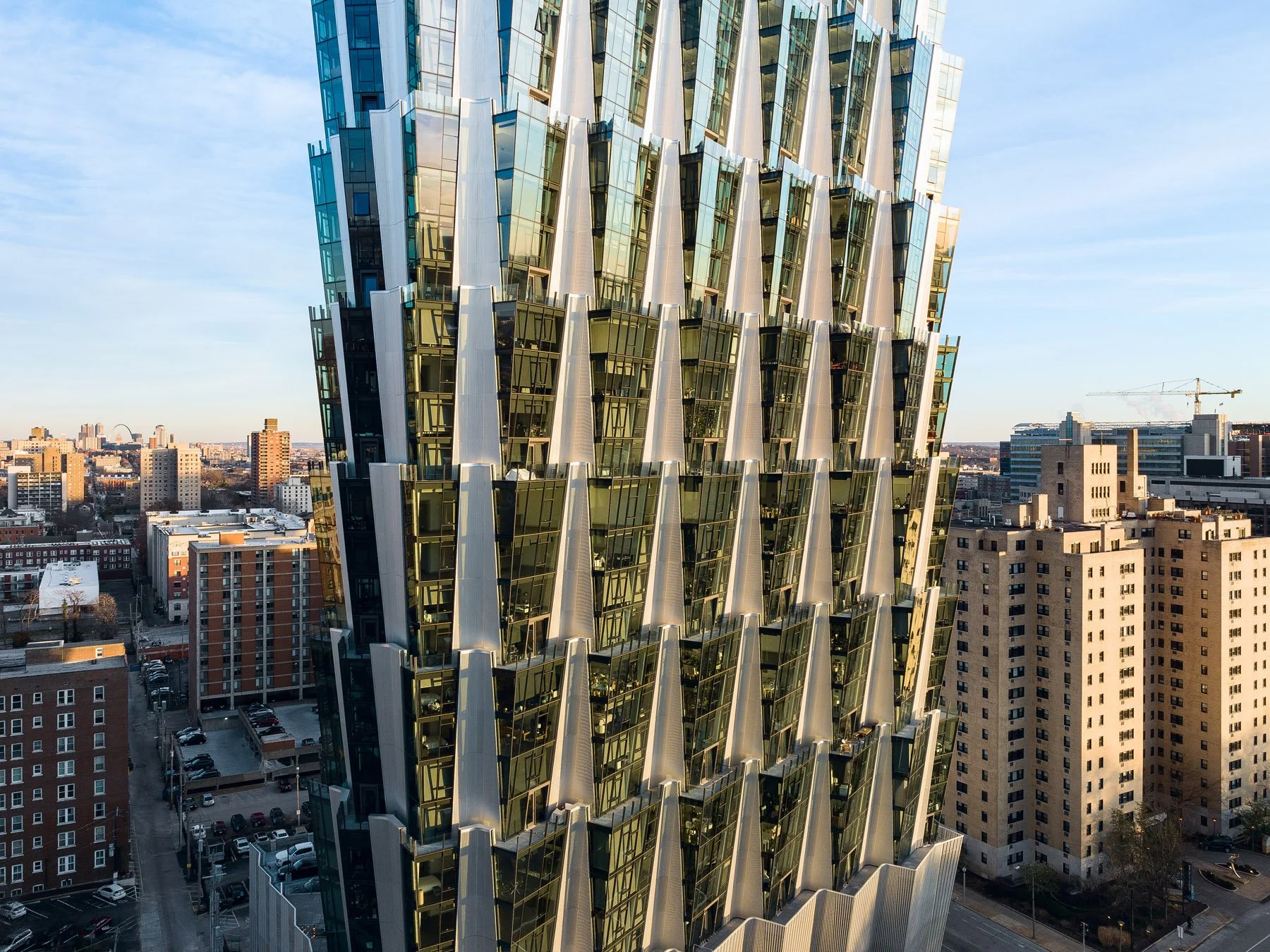 One Hundred Above the Park aerial oblique of faceted glass curtainwall and splayed fin fins at sunset, by Studio Gang - architectural photographer St. Louis Missouri