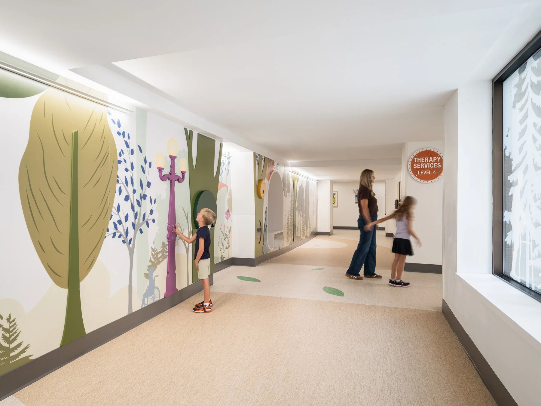 St. Louis Children’s Hospital therapy corridor mural with interactive lamp post, by CannonDesign - architectural photographer St. Louis Missouri