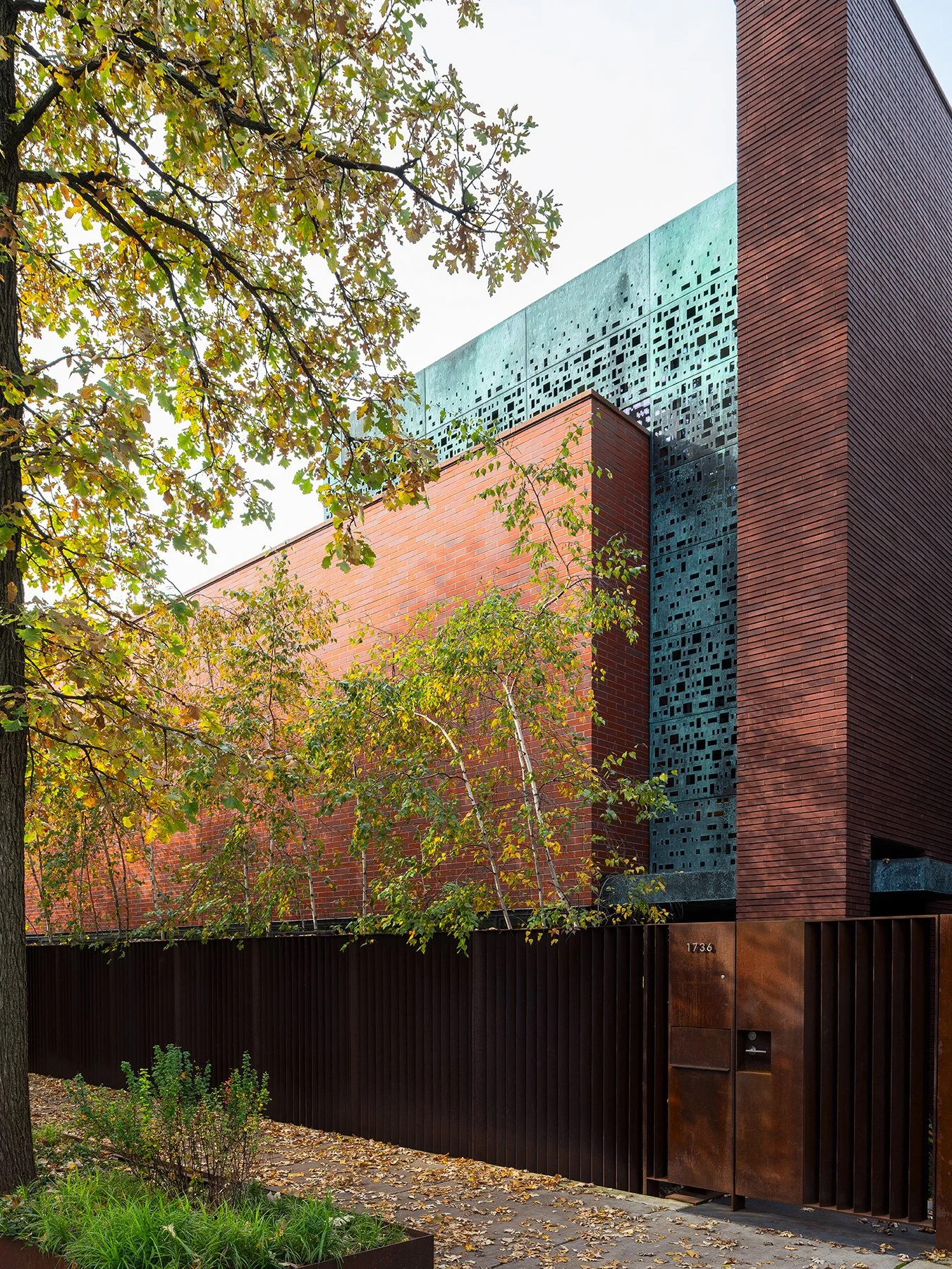 Wood House exterior brick and perforated copper facade by Brininstool + Lynch, Chicago Illinois - architectural photographer Chicago