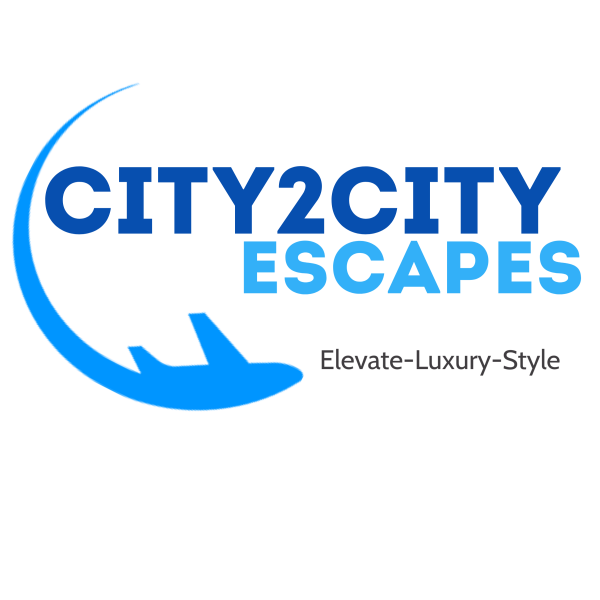 Logo for City2City Escapes featuring a blue airplane and curved line, with the tagline "Elevate-Luxury-Style."