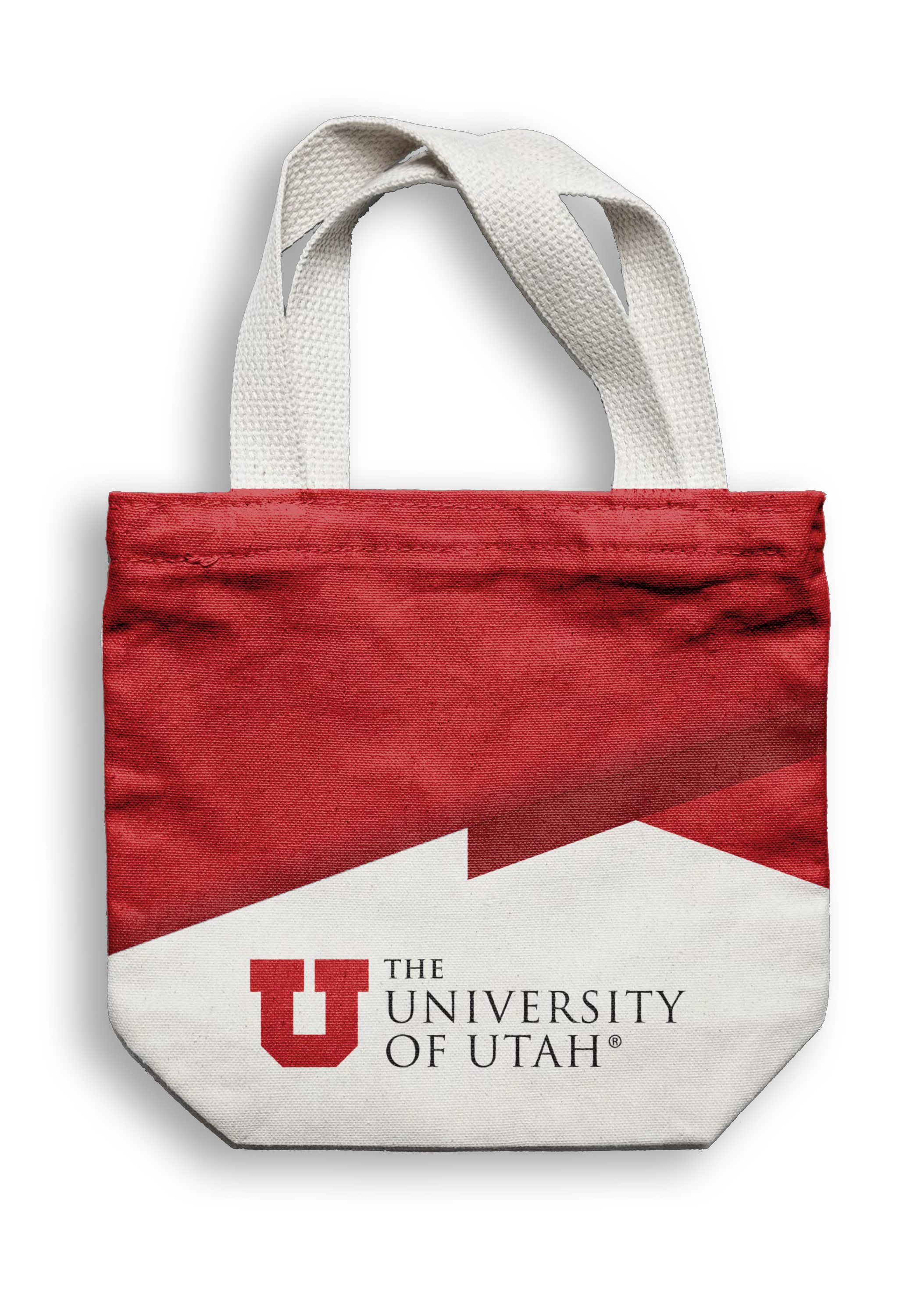 Red and white University of Utah tote bag with white handles against a black background.