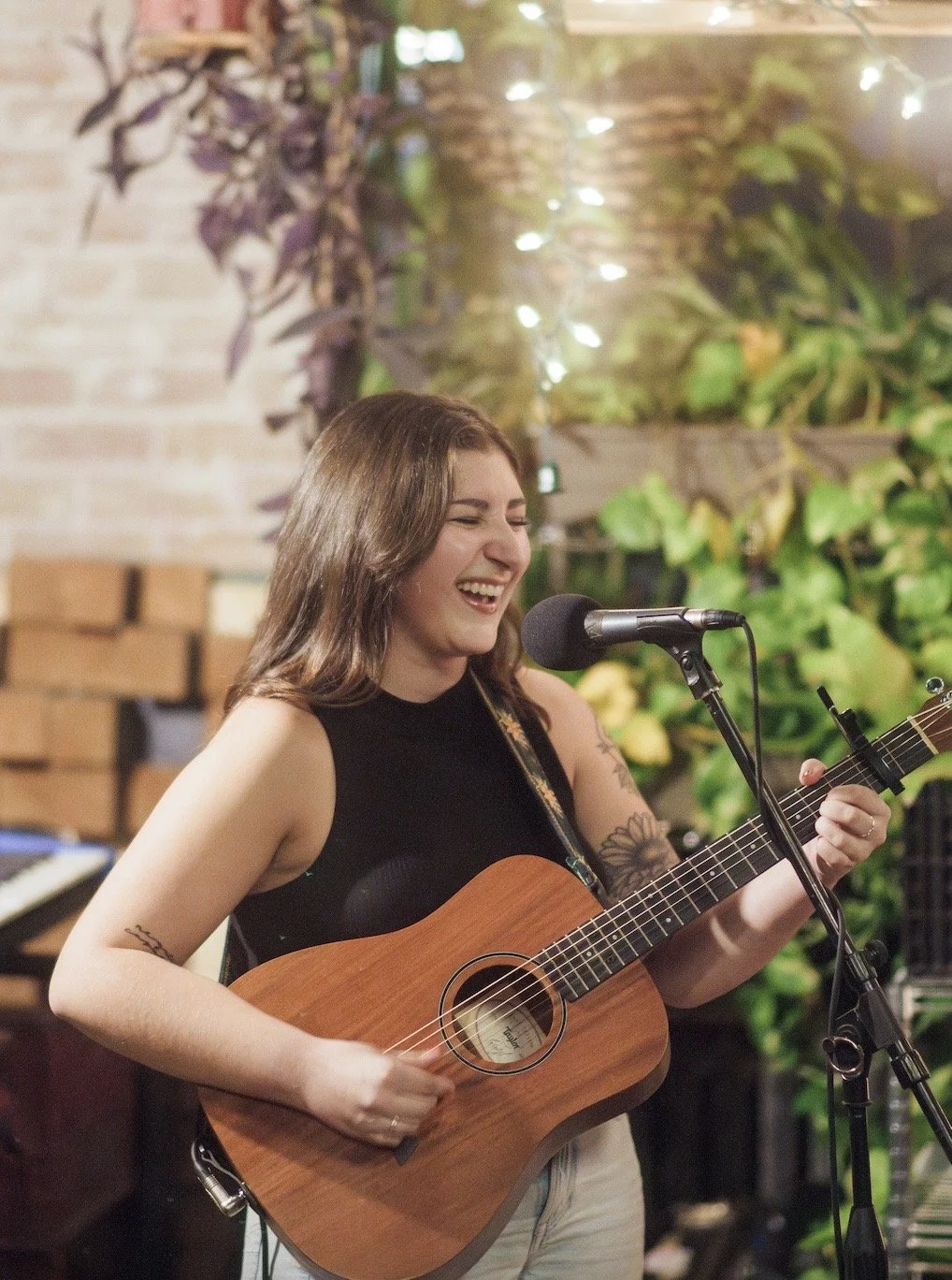 Performing a solo set at a loft show in the Plateau
