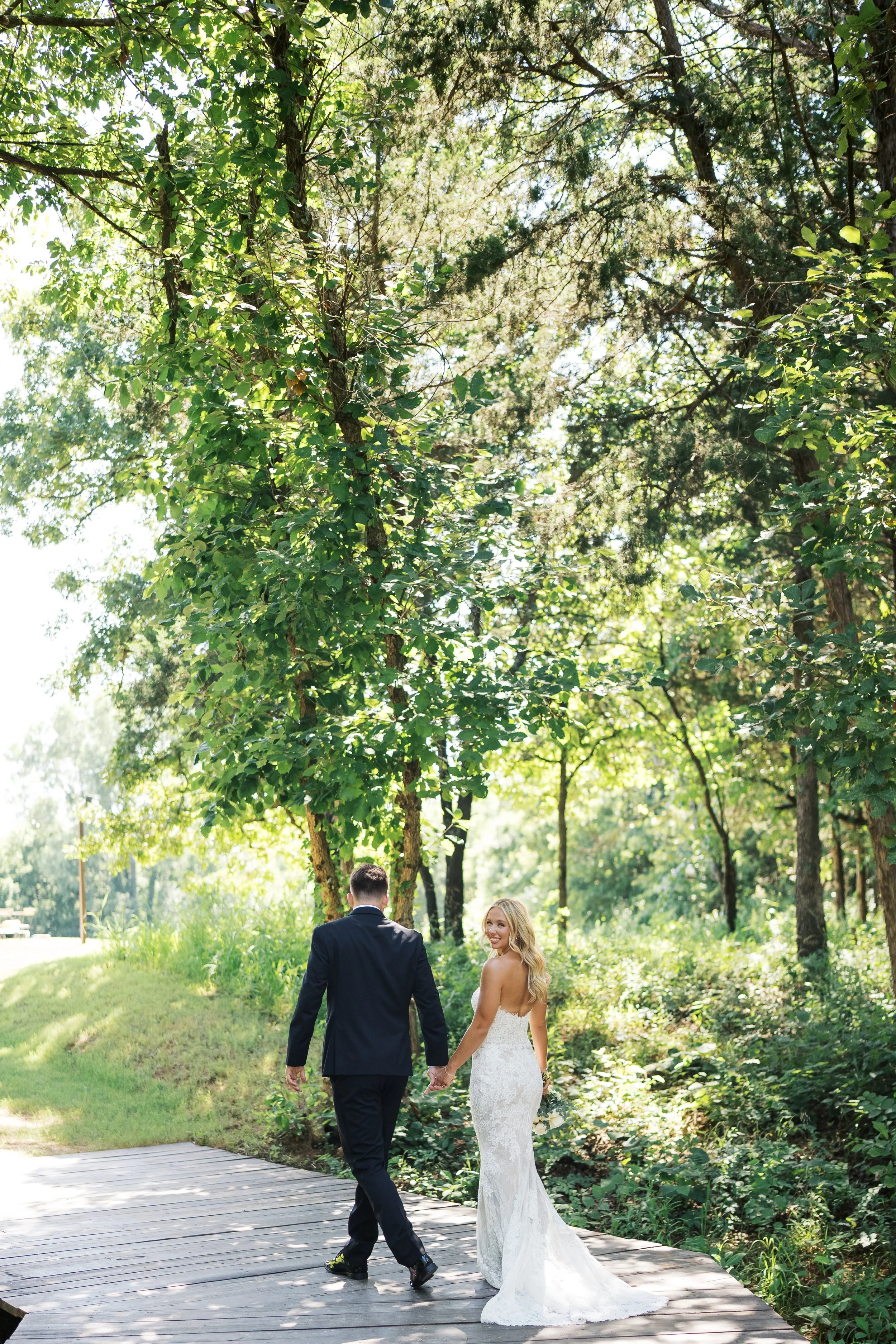 Bride & Groom on bride looking back.jpg