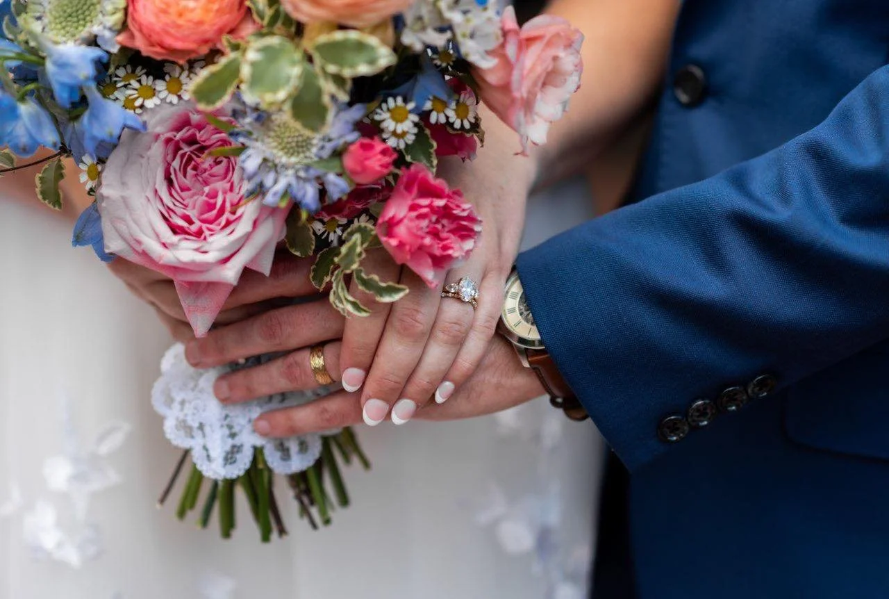 Summer is wedding season! Congratulations to this beautiful couple, Sam and Anna!