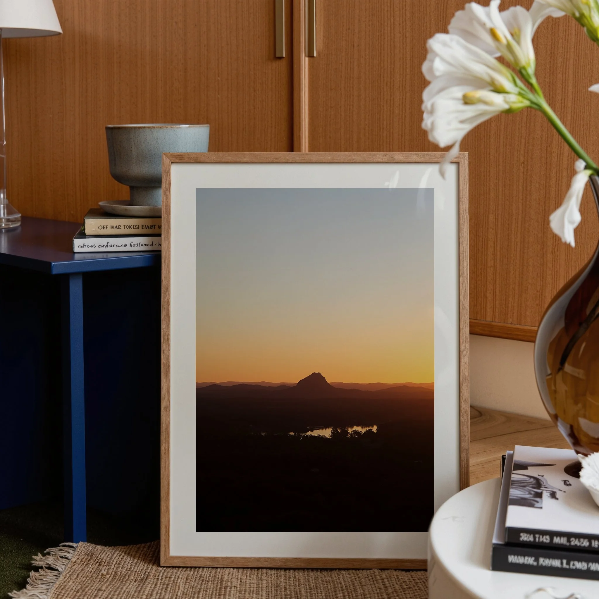 Tinbeerwah with mockup in living room close up.jpg